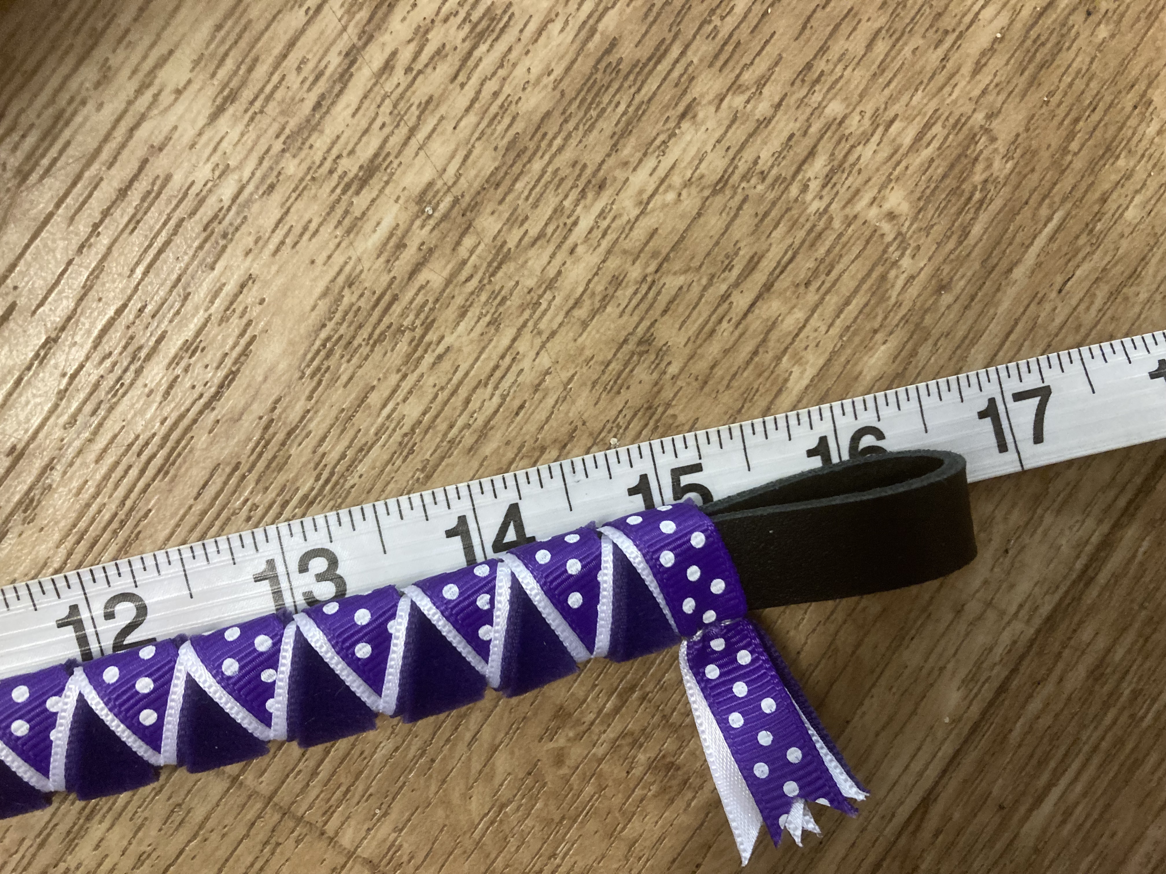 Purple polka browband. Black leather base. 16.5” Full size.
