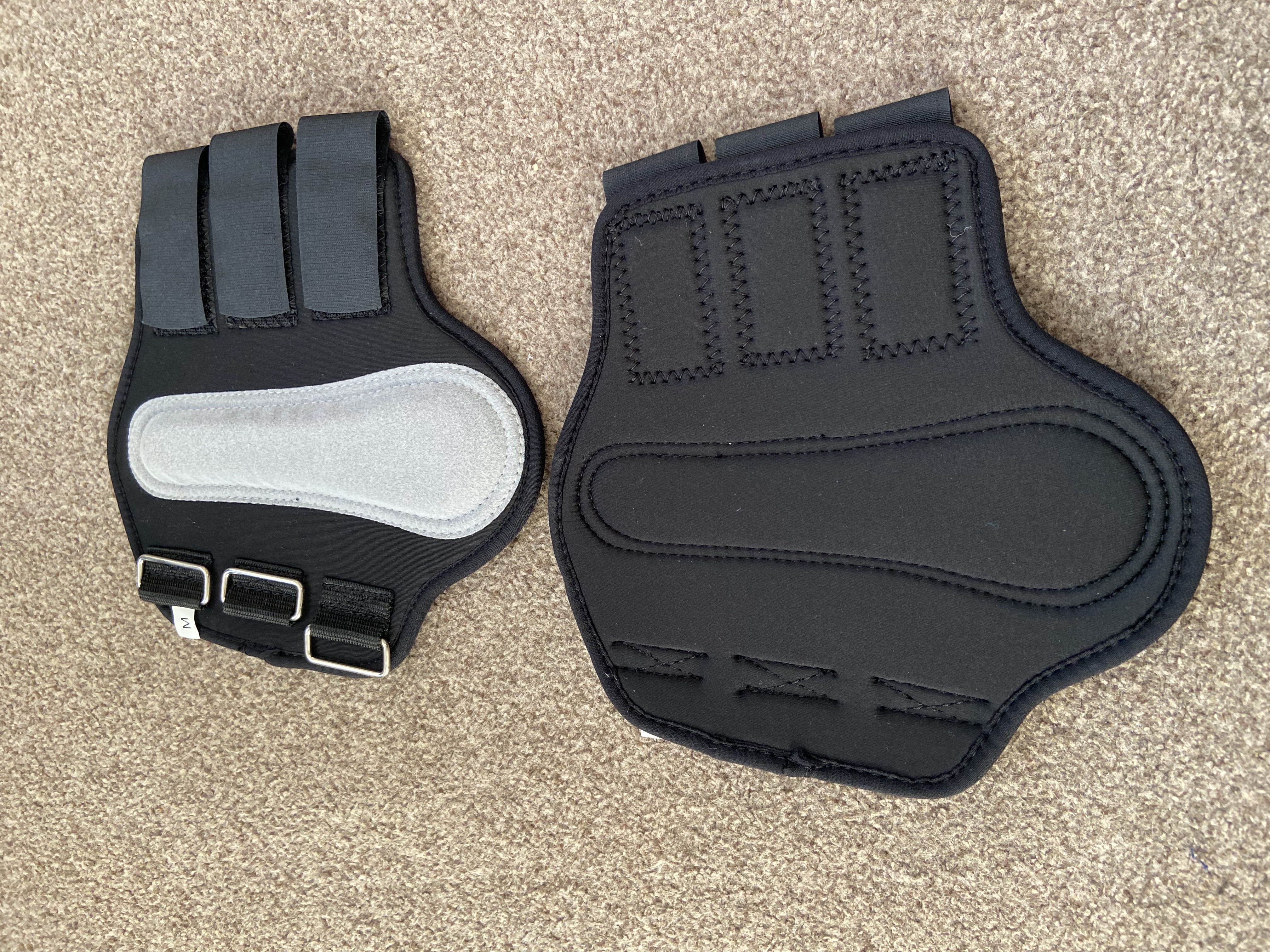 Black neoprene brushing boots.  BN. Pony size.