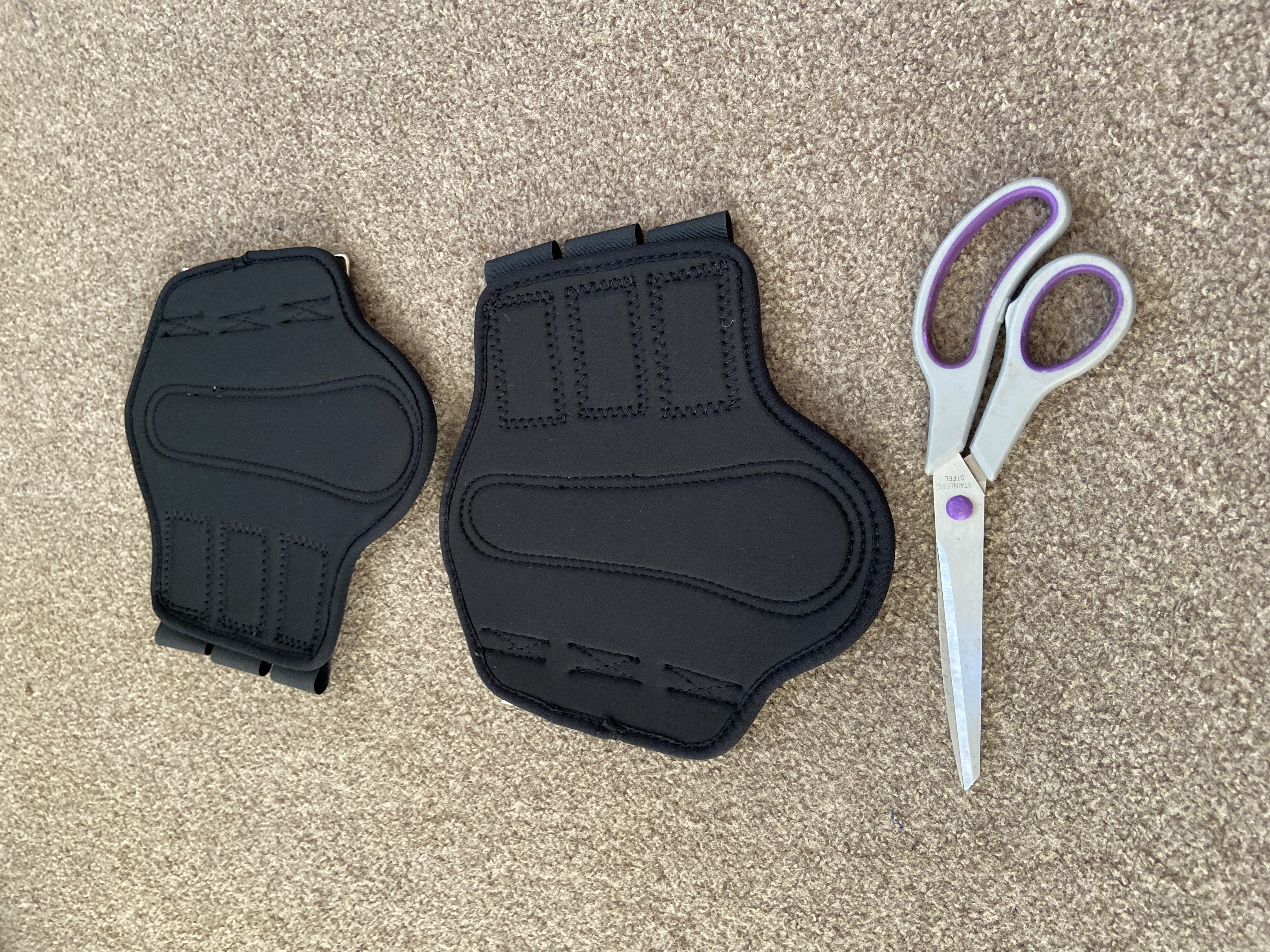 Black neoprene brushing boots.  BN. Pony size.