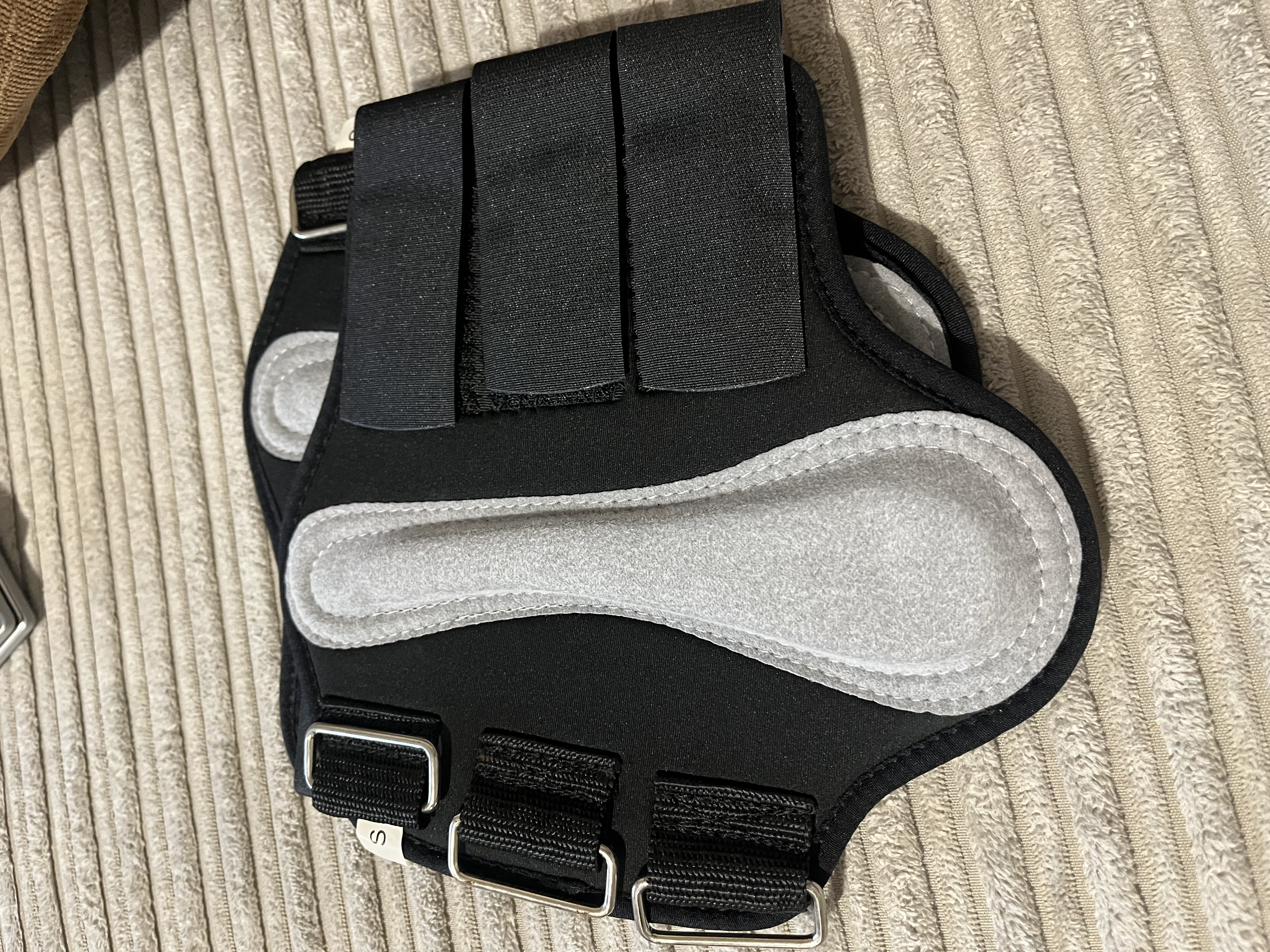 Black neoprene brushing boots.  BN. Small Pony size.