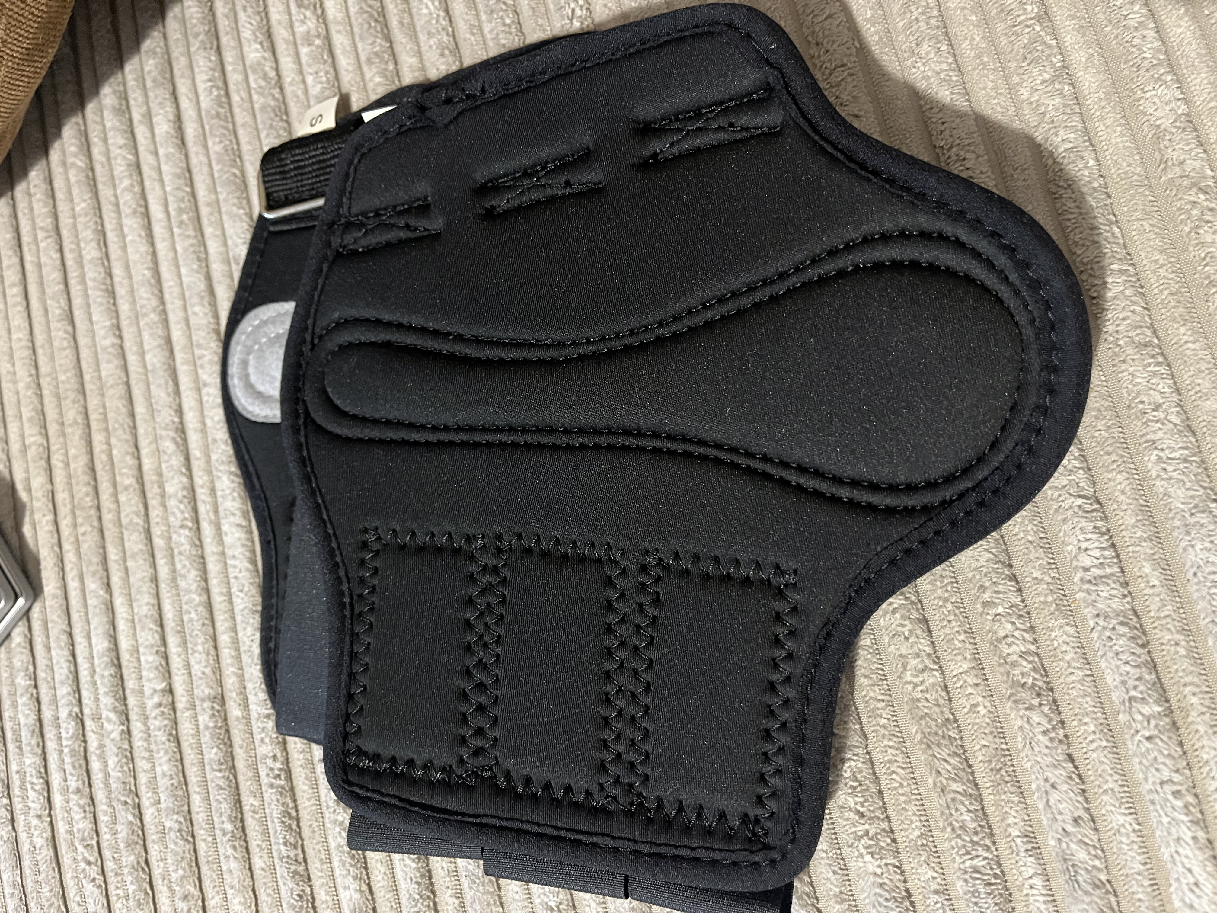 Black neoprene brushing boots.  BN. Small Pony size.