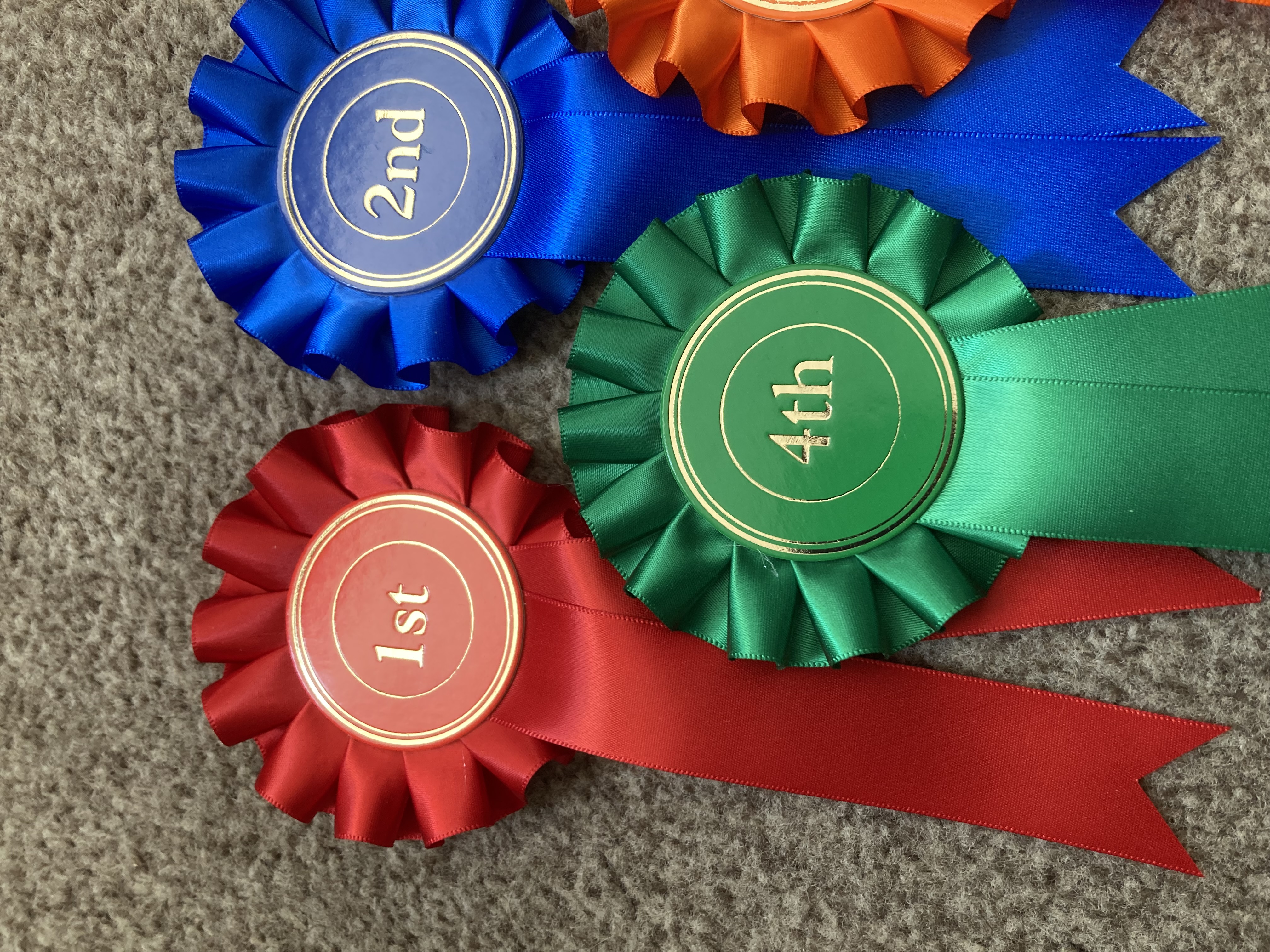 1st to 5th one tier rosettes. 50mm centres.