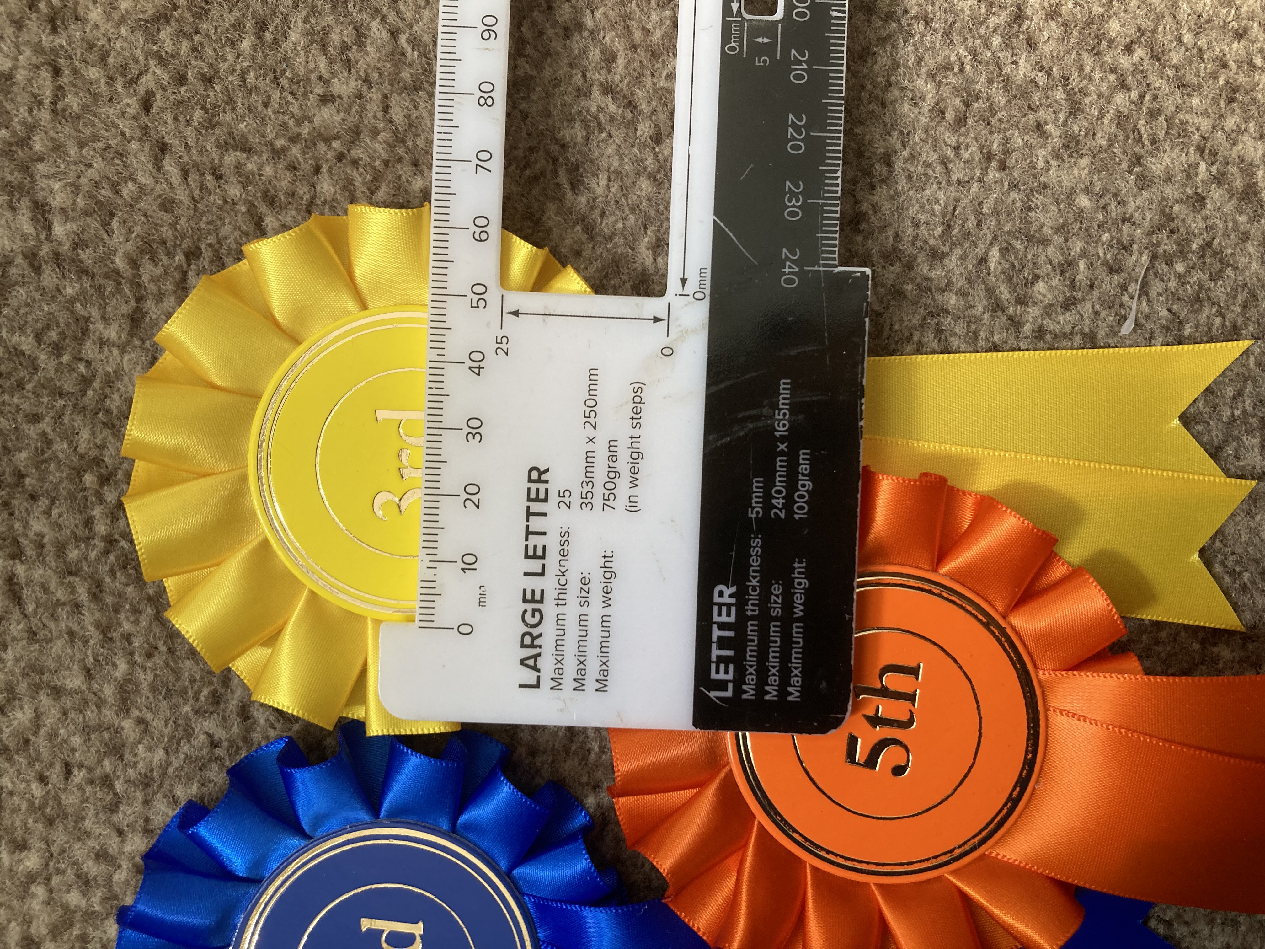 1st to 5th one tier rosettes. 50mm centres.