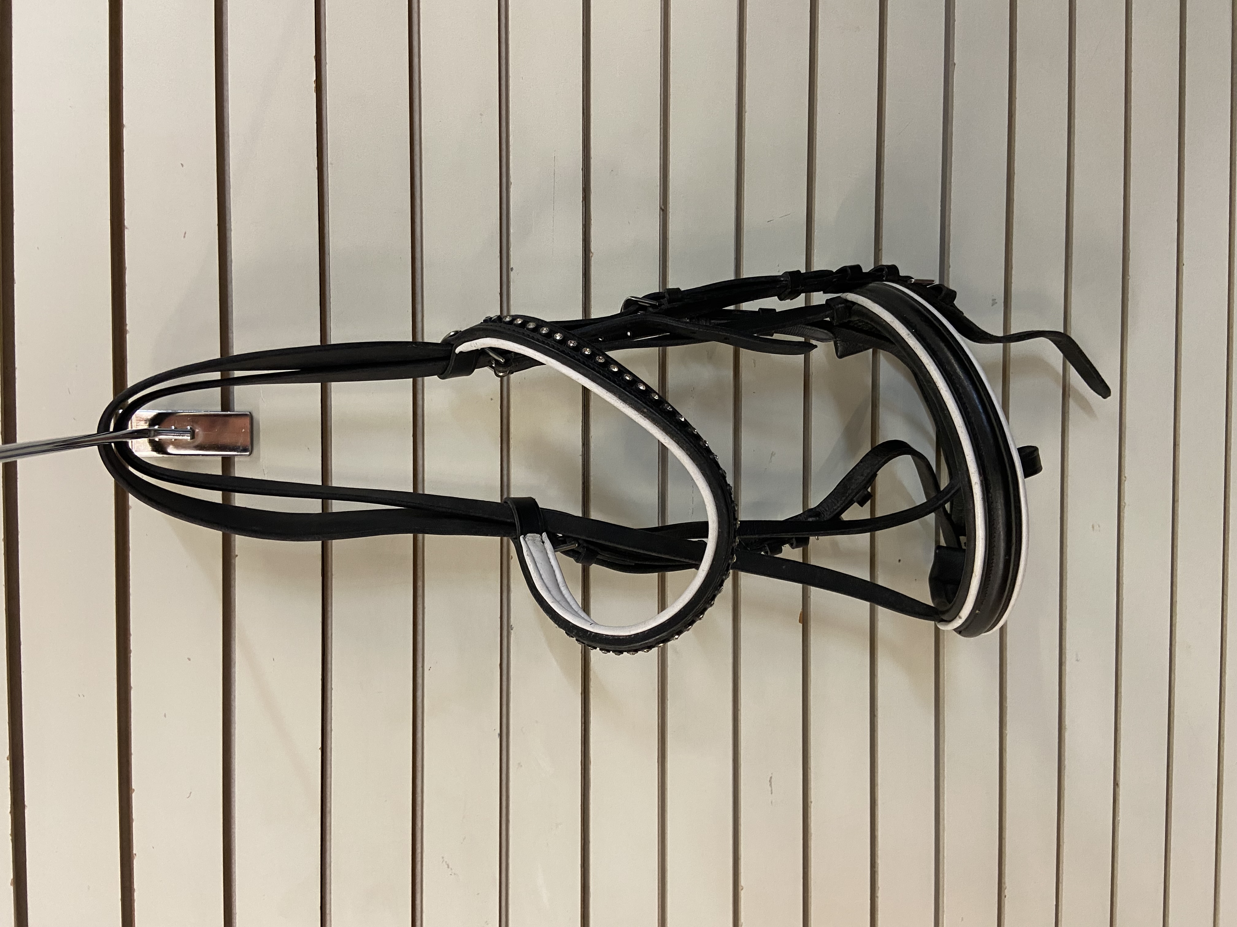 Full size Rhinegold flash bridle with diamante browband. Black. Preowned. Good condition