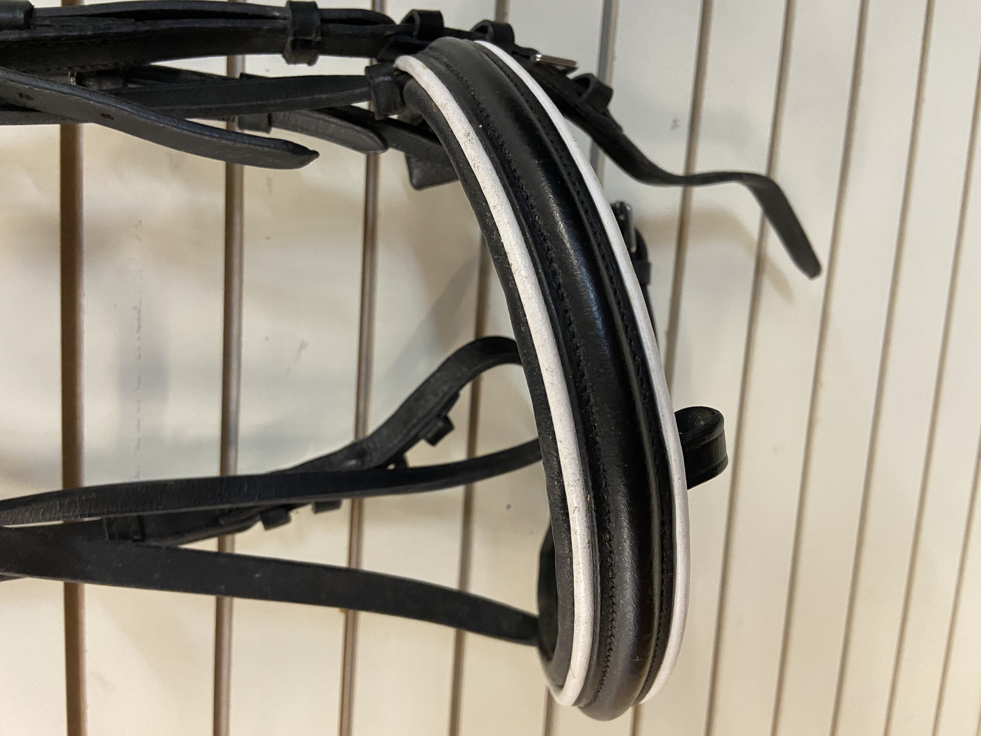 Full size Rhinegold flash bridle with diamante browband. Black. Preowned. Good condition