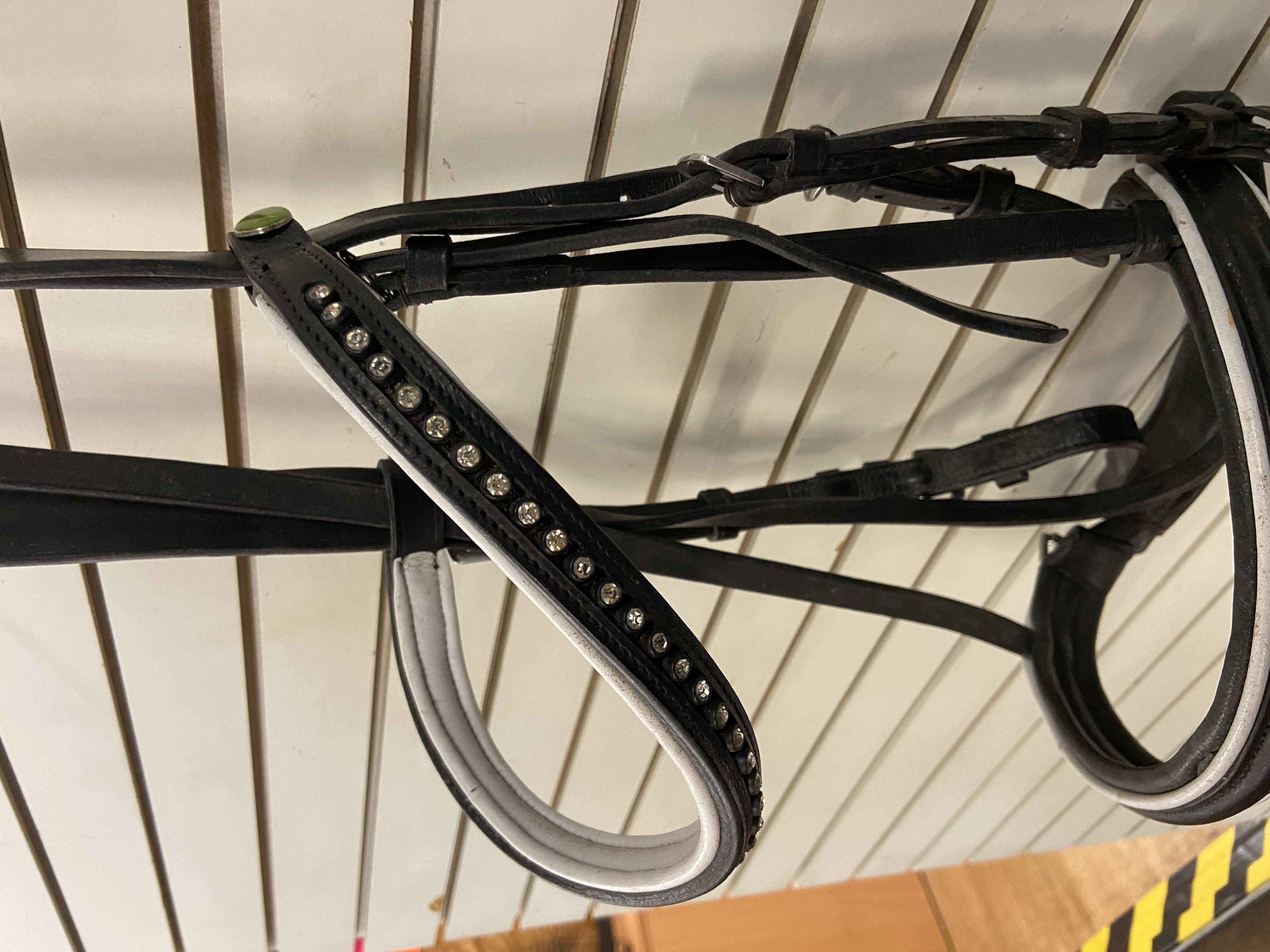 Full size Rhinegold flash bridle with diamante browband. Black. Preowned. Good condition