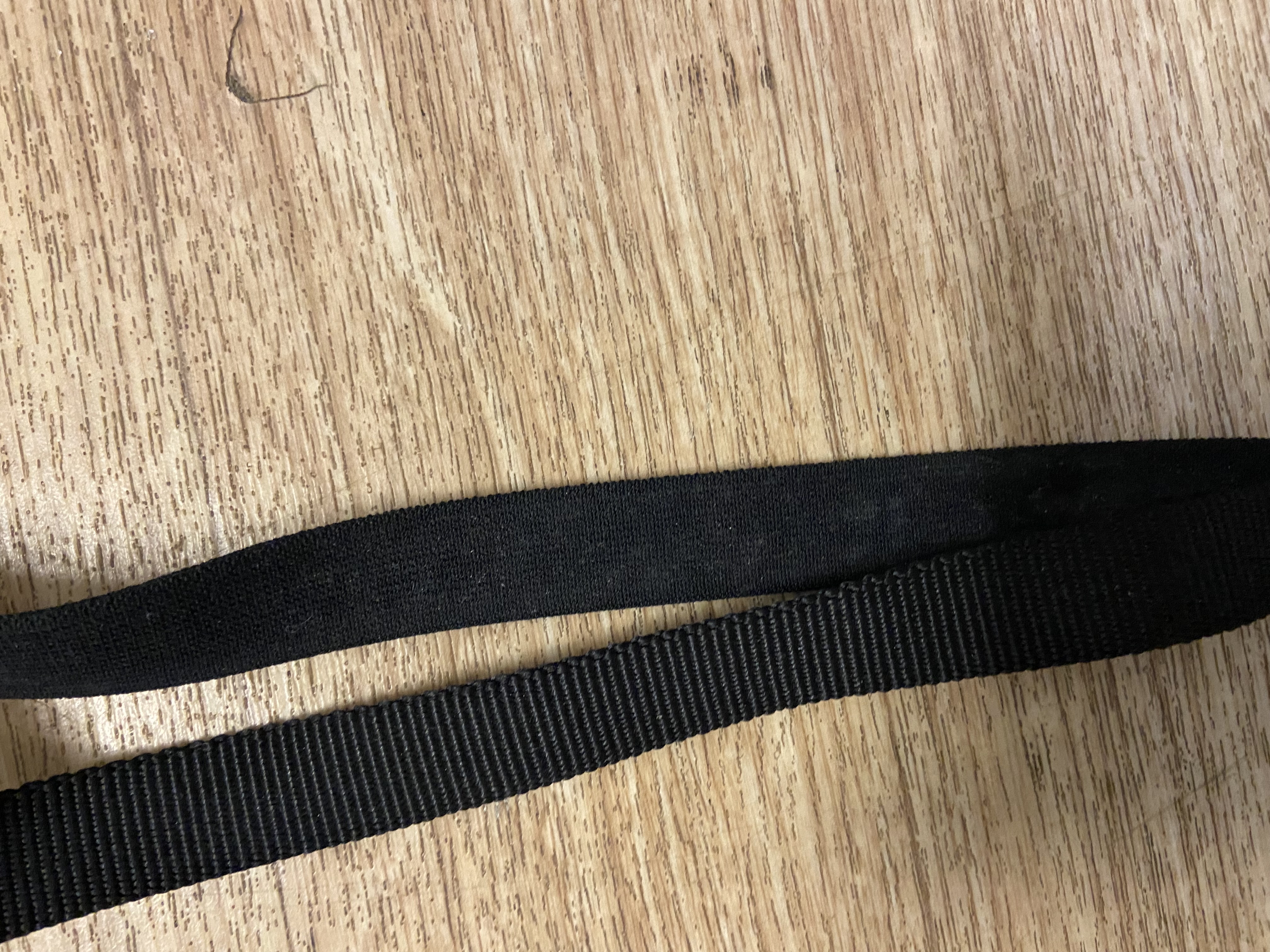 Black nylon side reins. One size. Preowned. Never used