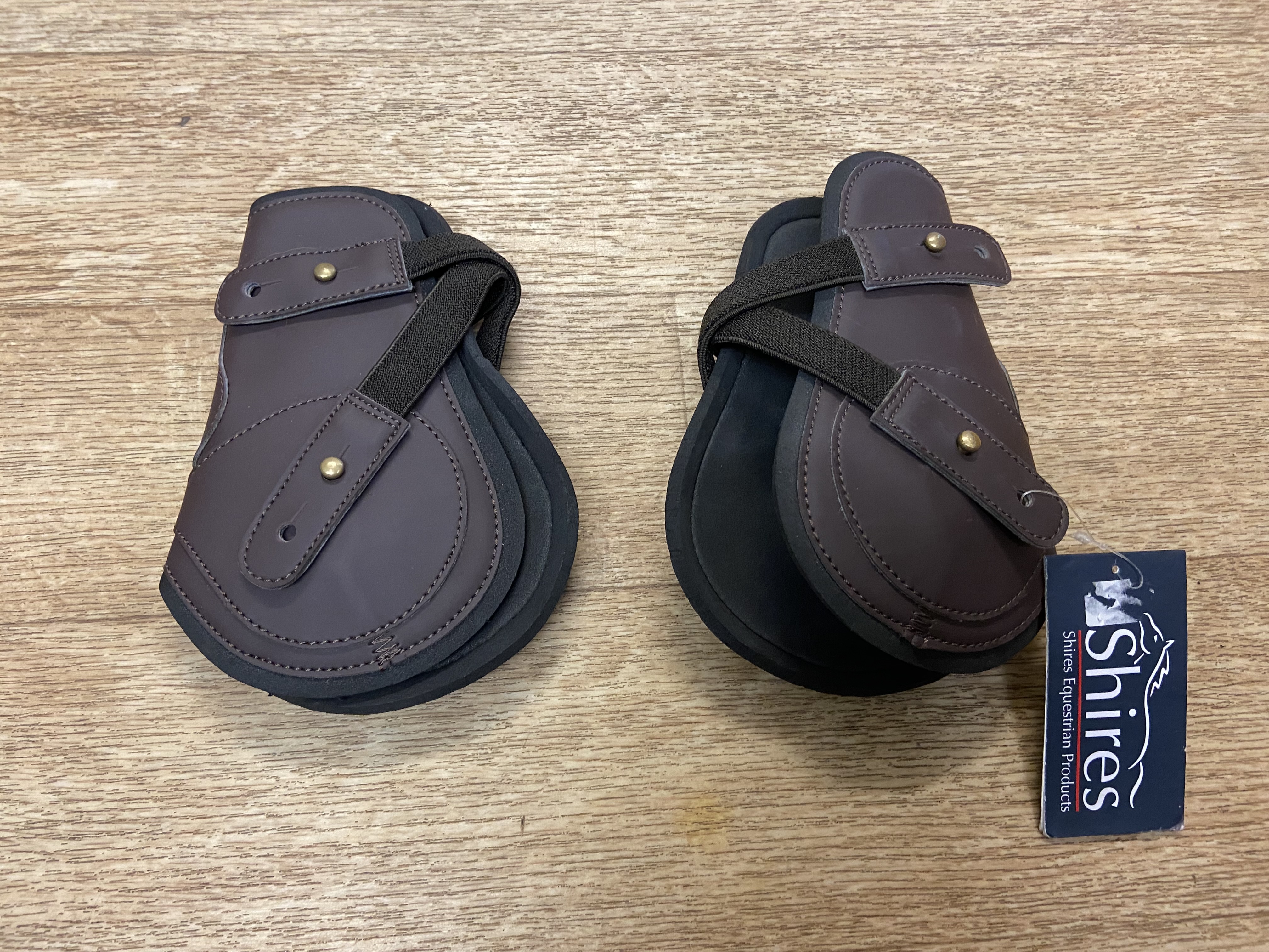 Shires Brown fetlock boots with elasticated straps. Full size. BNWT