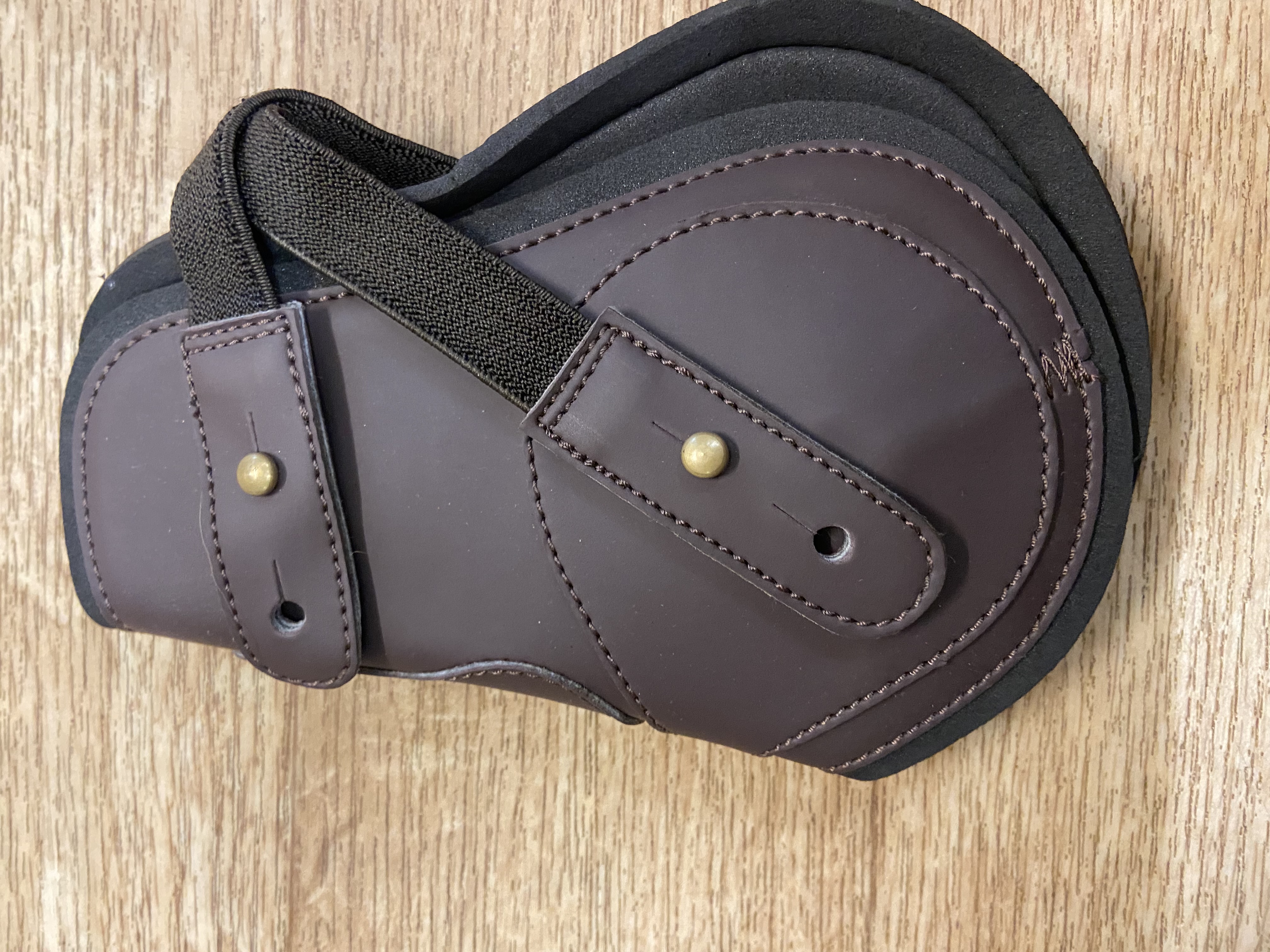 Shires Brown fetlock boots with elasticated straps. Full size. BNWT