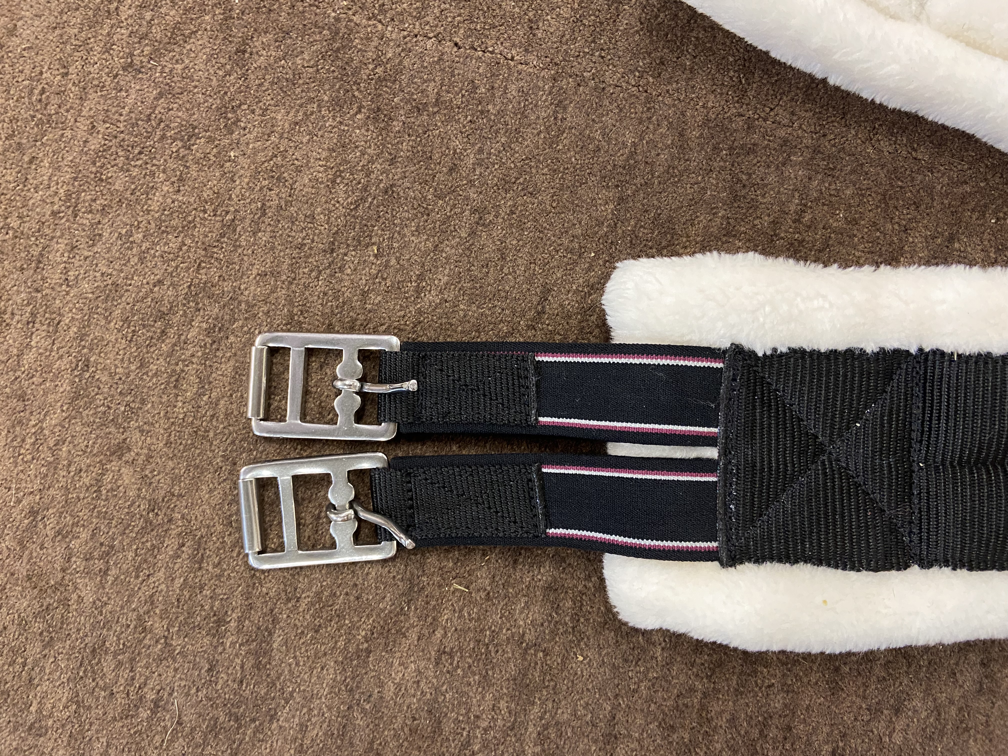 Fluffy girth with elasticated ends. Various colours and sizes. Brand-new without tags.