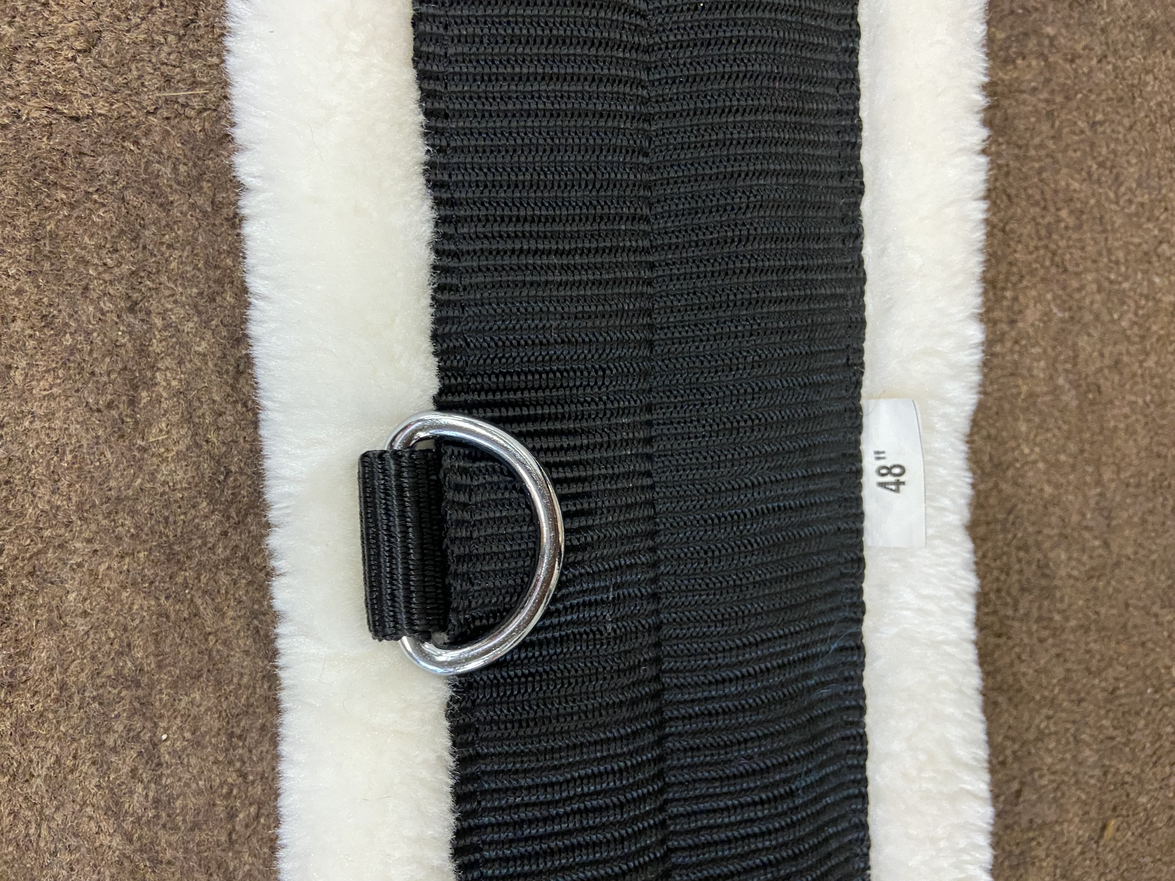 Fluffy girth with elasticated ends. Various colours and sizes. Brand-new without tags.