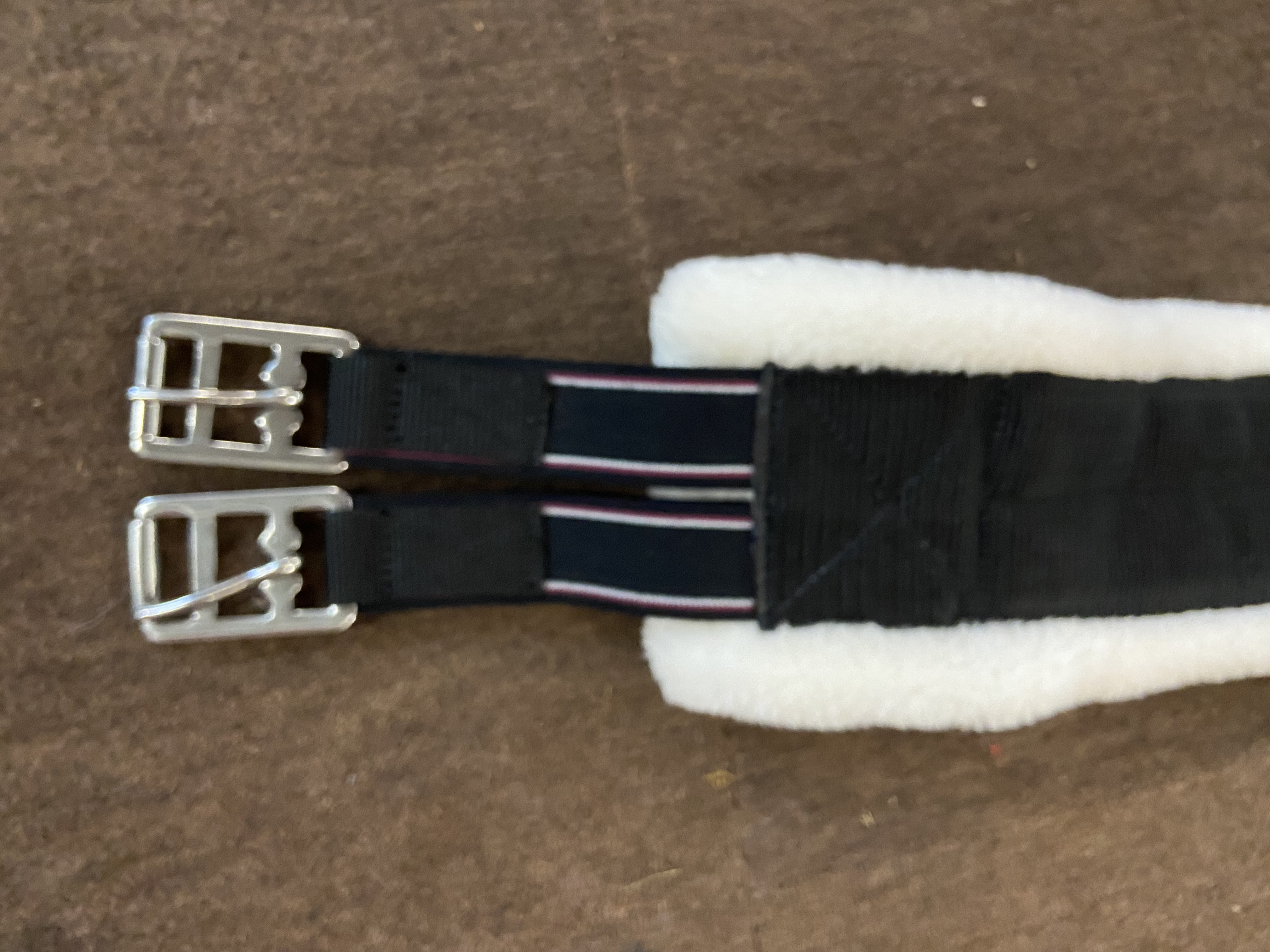 Fluffy girth with elasticated ends. Various colours and sizes. Brand-new without tags.