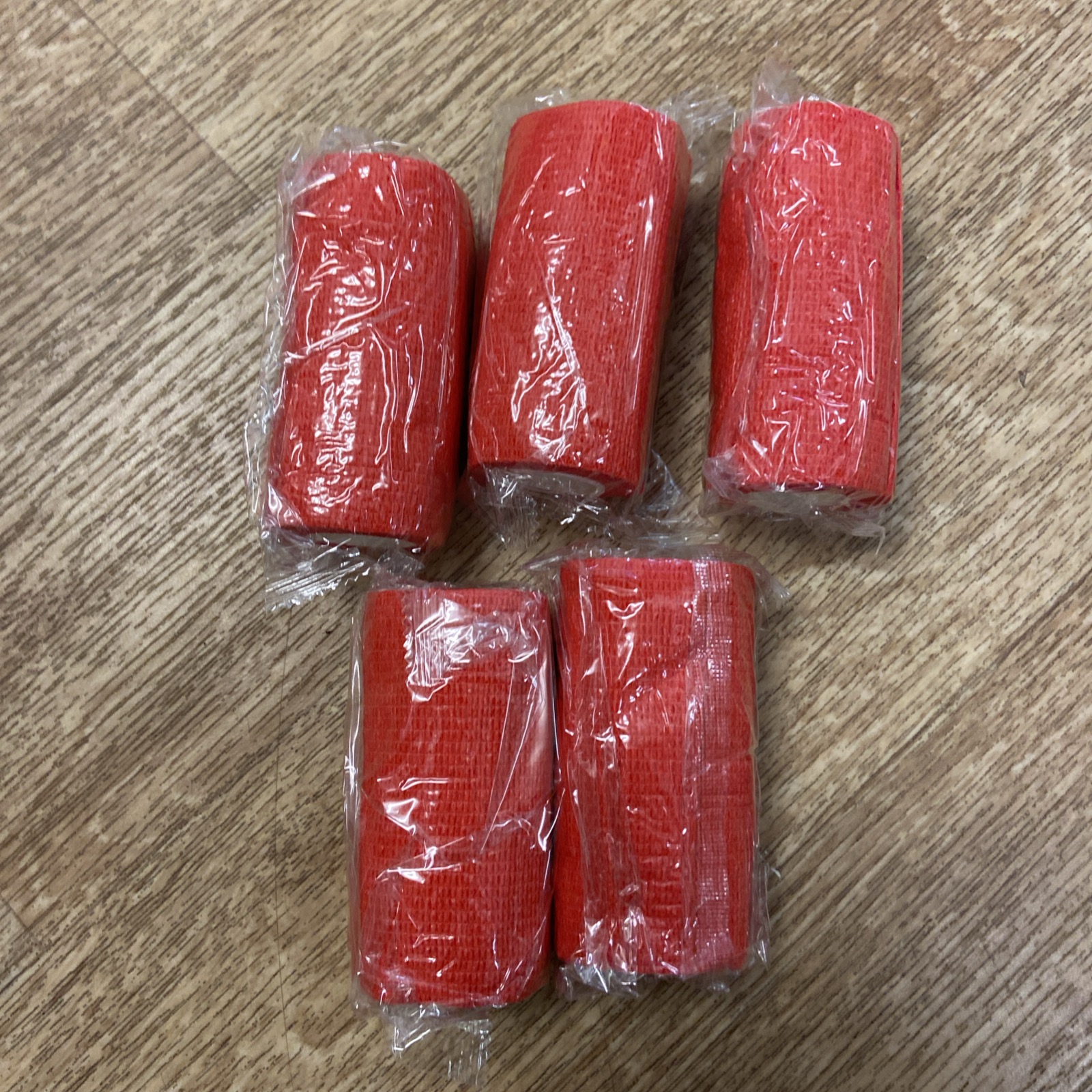 5 x red cohesive bandages. BNIB. 10cm x 4.5m.  Horses/Dogs/people. Etc.