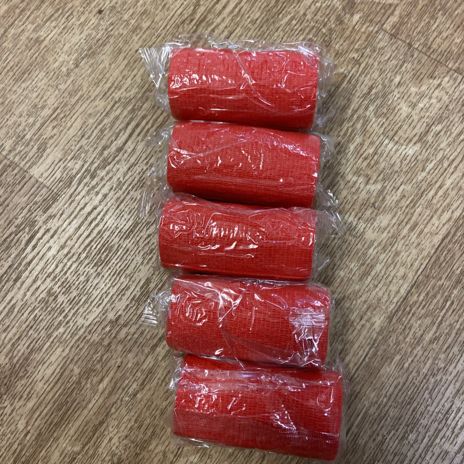 5 x red cohesive bandages. BNIB. 10cm x 4.5m.  Horses/Dogs/people. Etc.