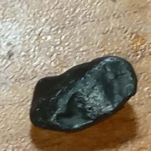 Rough honey chrysoberyl cat's eye gemstone, 4.45 carats