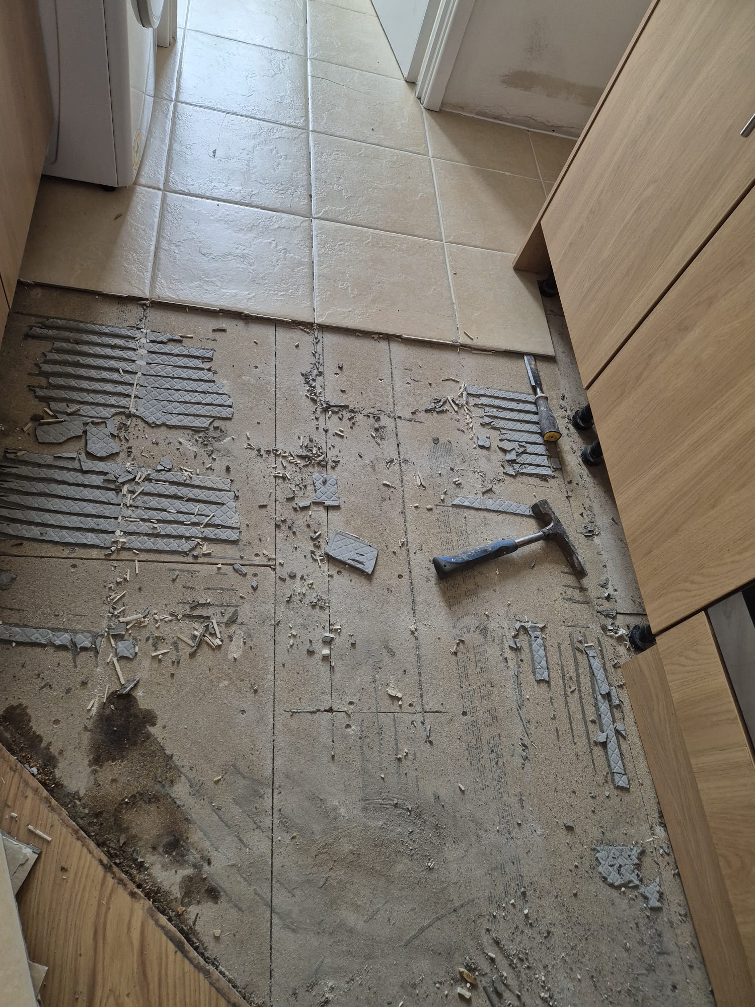 Removing current flooring system for mass loaded vinyl install