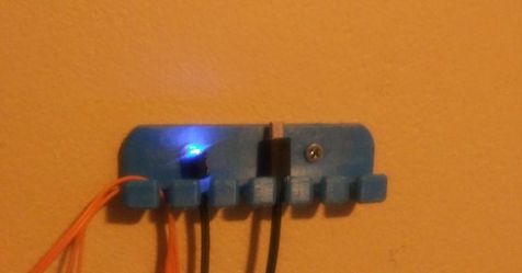 Multi-USB wall mount cord organizer