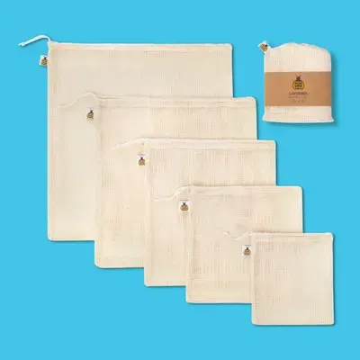 Superbee Organic Mesh Produce Bags with fresh vegetables inside.