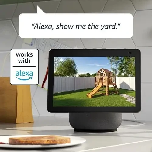 A Blink Outdoor 4 camera mounted on a home's exterior, demonstrating its intended outdoor use.