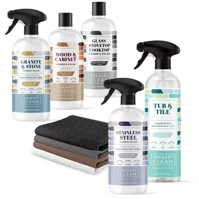 A collection of Therapy Clean All-Natural Cleaners with plant-based ingredients.