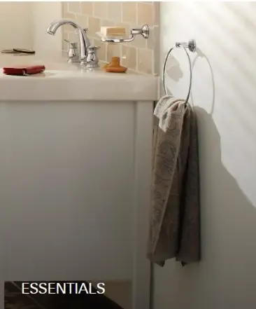 Grohe Essentials 18-inch Towel Bar in Brushed Cool Sunrise finish mounted on bathroom wall