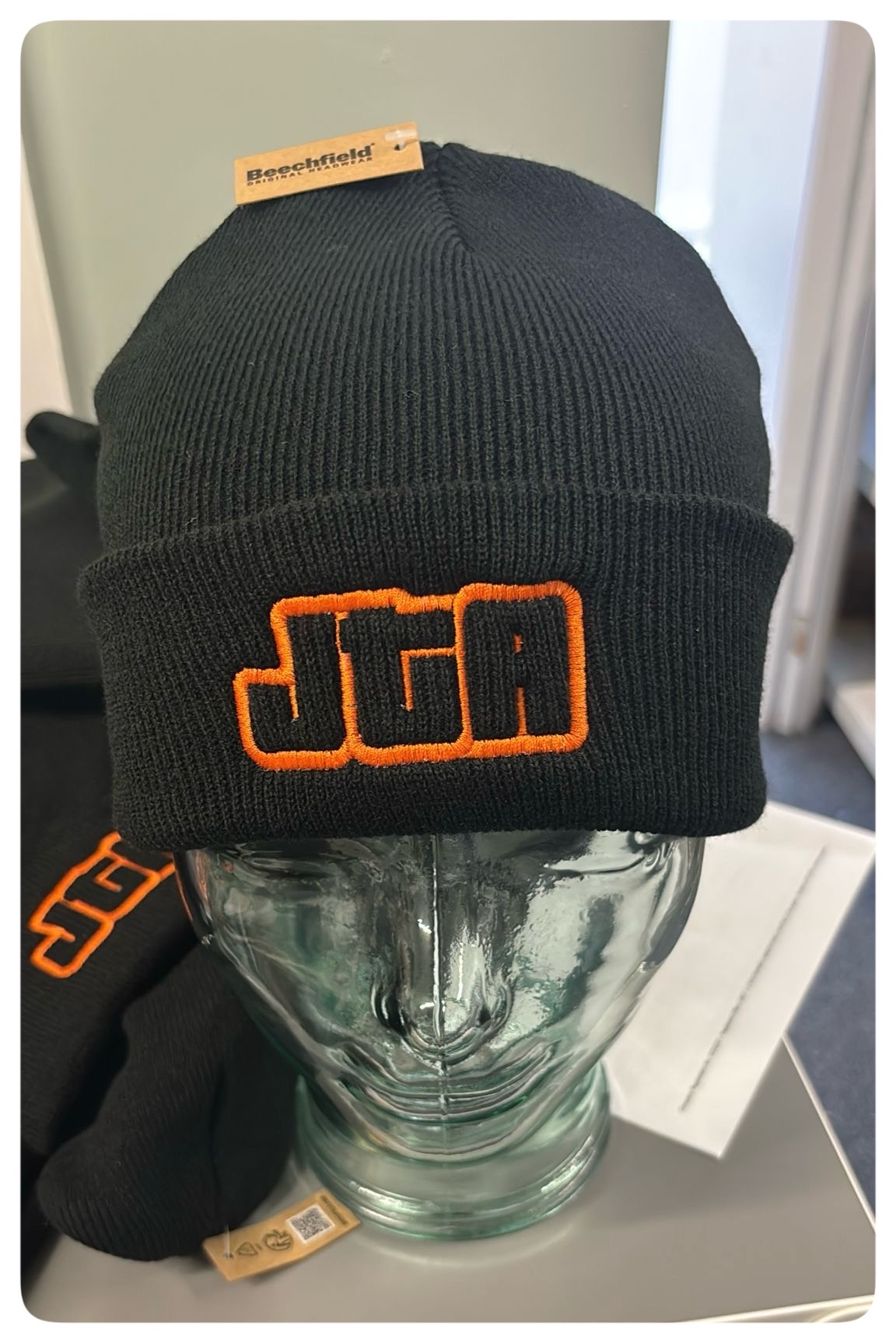 JTA woolly hat. Orange stitch.