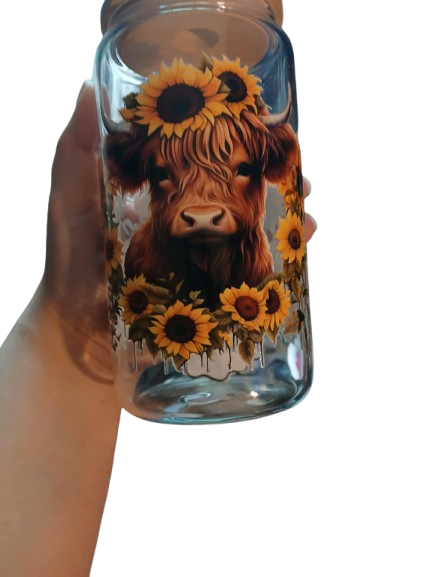 Cow with sunflowers