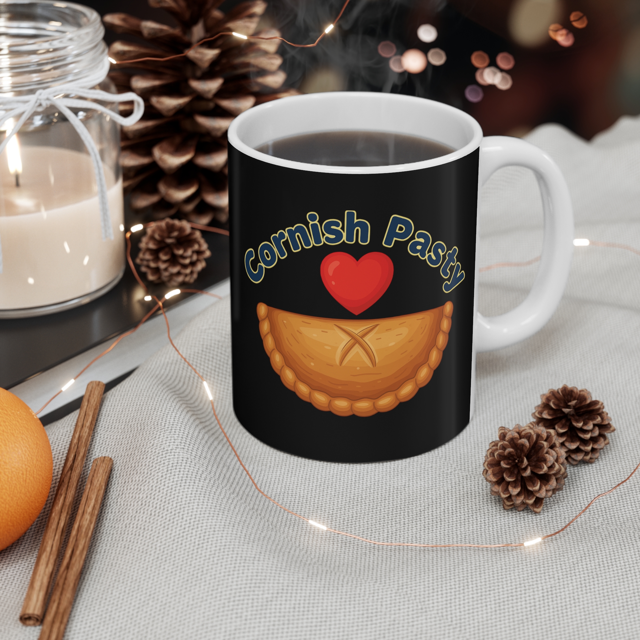 11oz coffee mug with a graphic cornish pasty and red heart design on a black back ground
