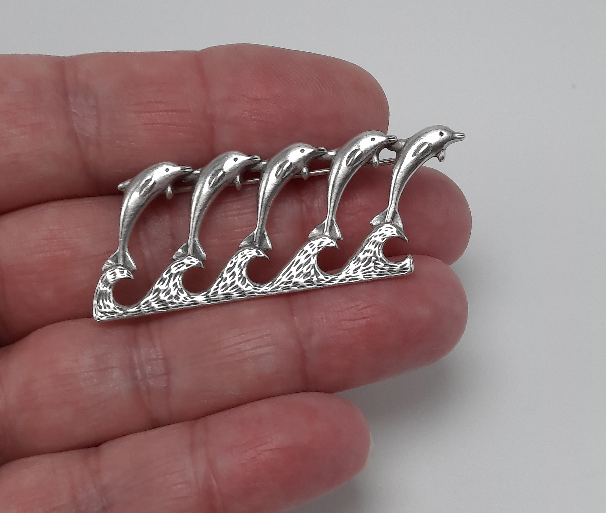 Sterling Silver Brooch with Five Leaping Dolphins