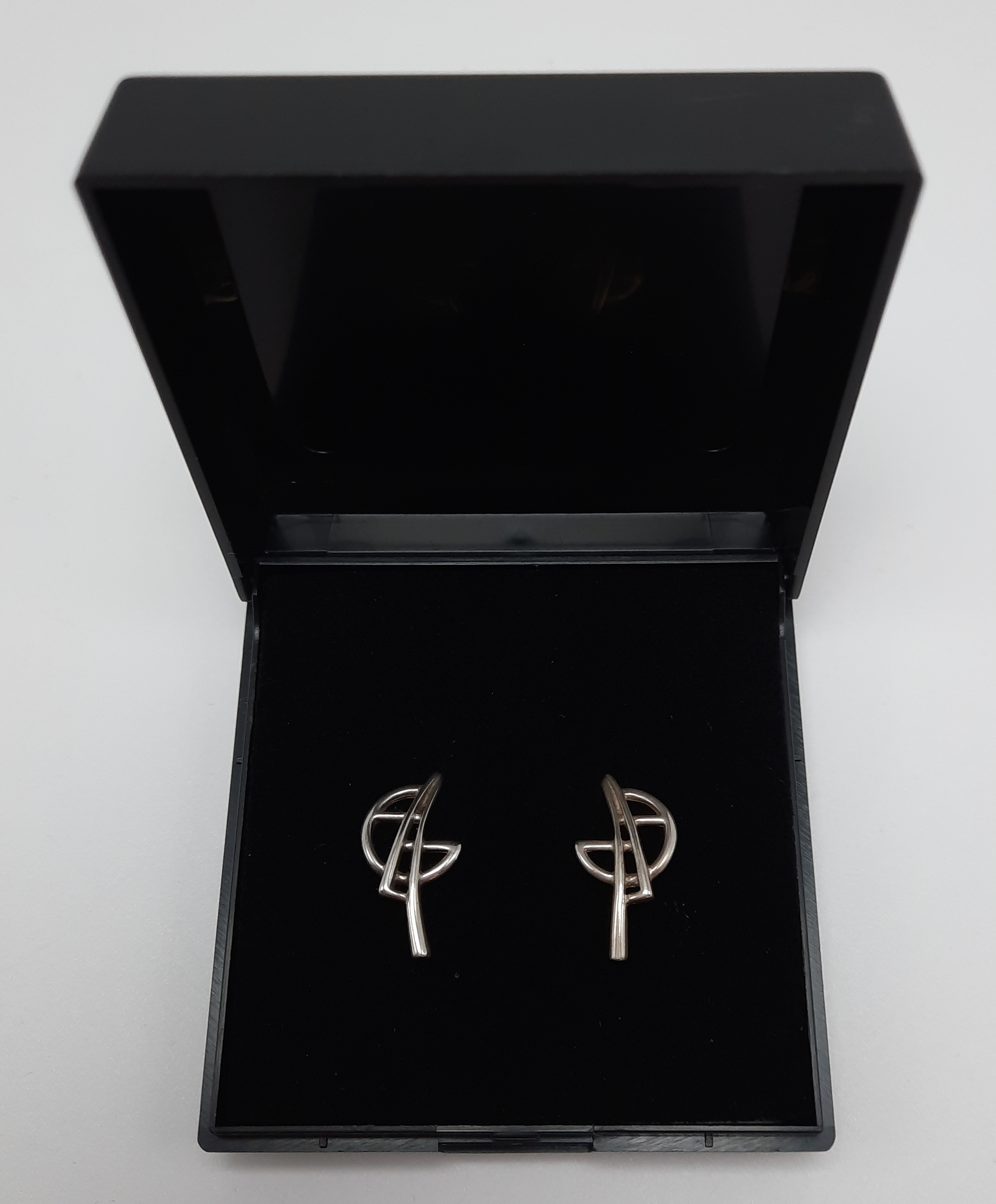 Stylish Sterling Silver Ear Studs by Carrick