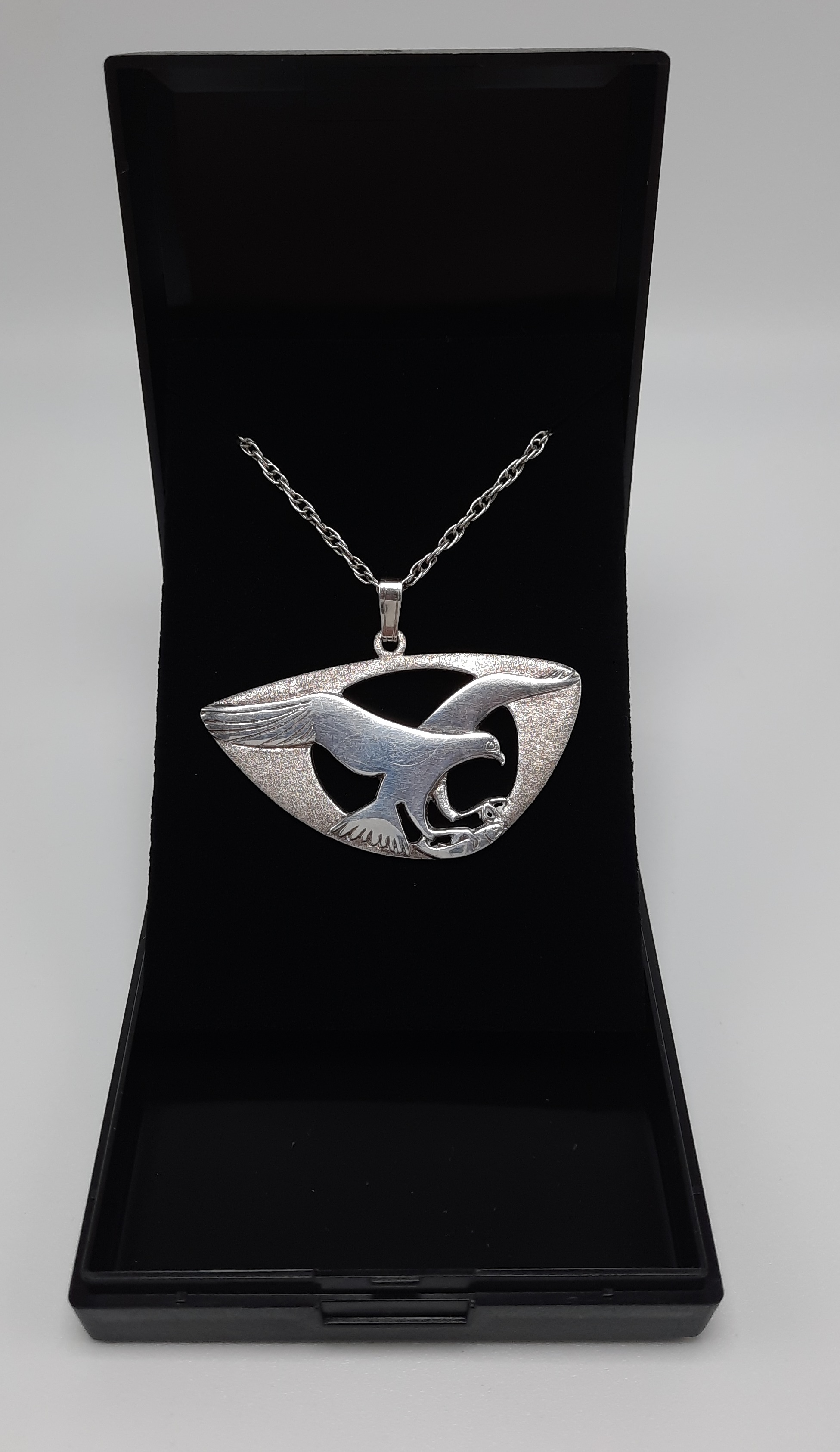 Sterling Silver Pendant of an Osprey in Flight with Salmon by Shetland Silver