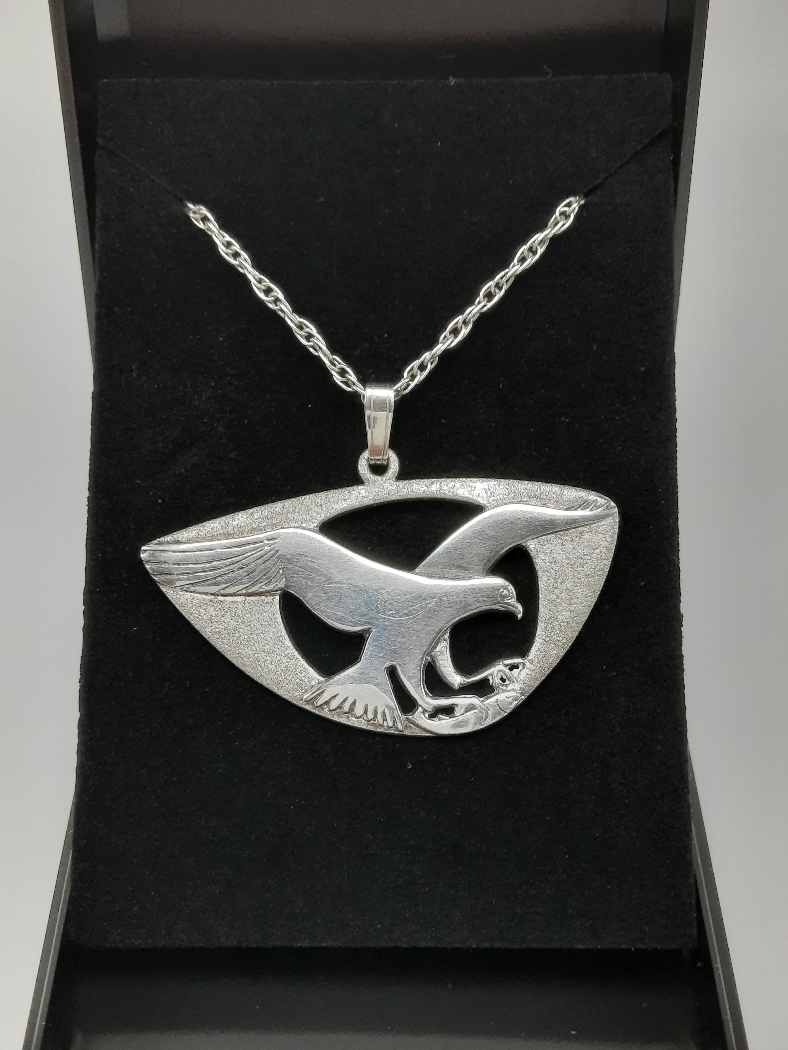 Sterling Silver Pendant of an Osprey in Flight with Salmon by Shetland Silver