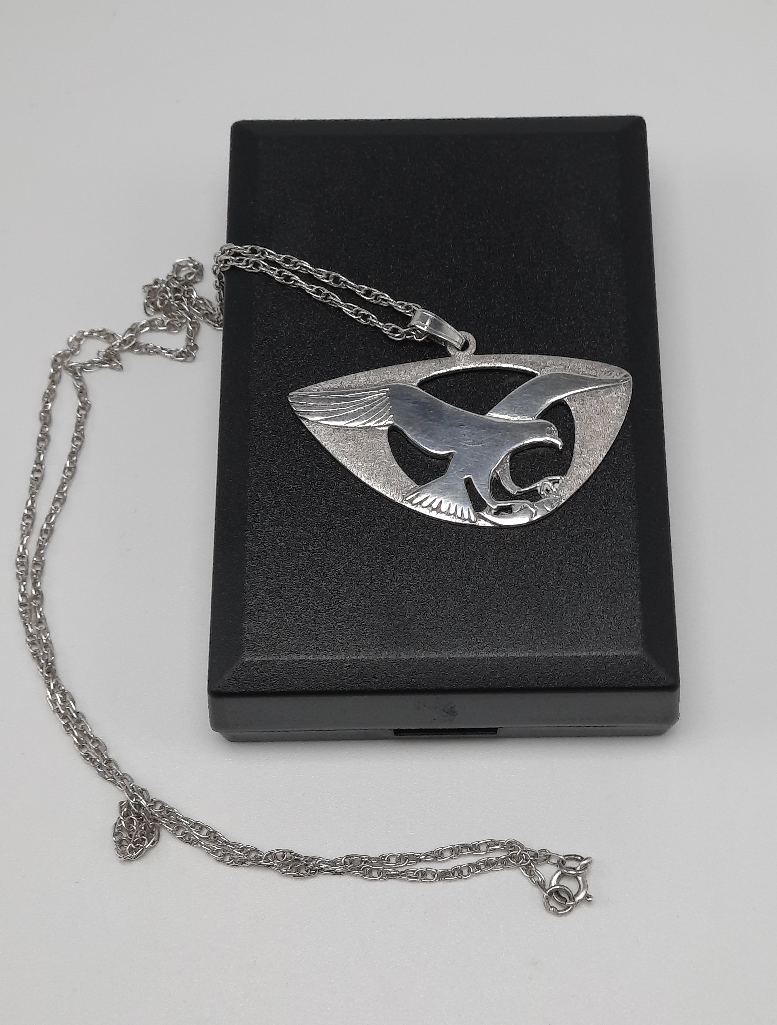 Sterling Silver Pendant of an Osprey in Flight with Salmon by Shetland Silver