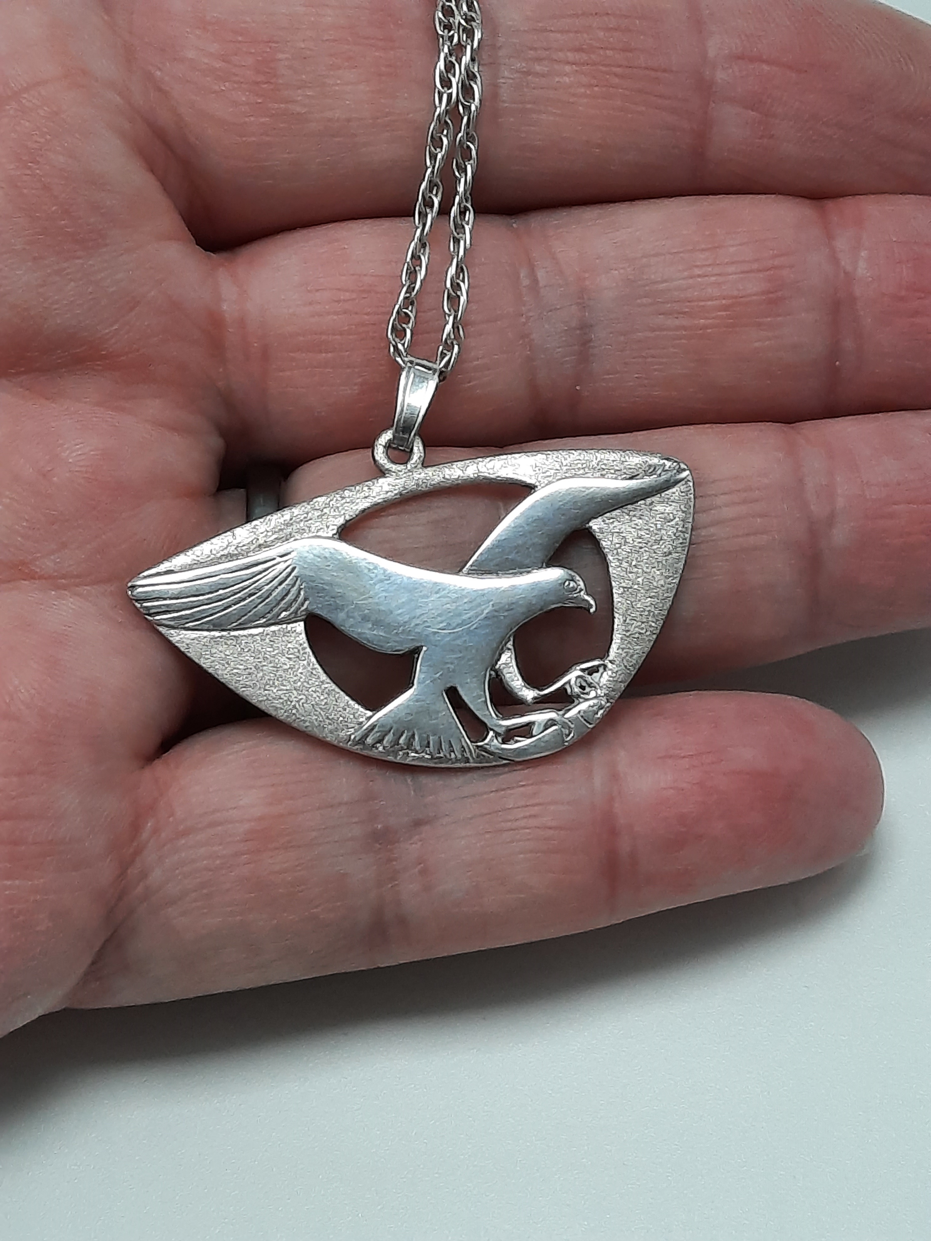 Sterling Silver Pendant of an Osprey in Flight with Salmon by Shetland Silver
