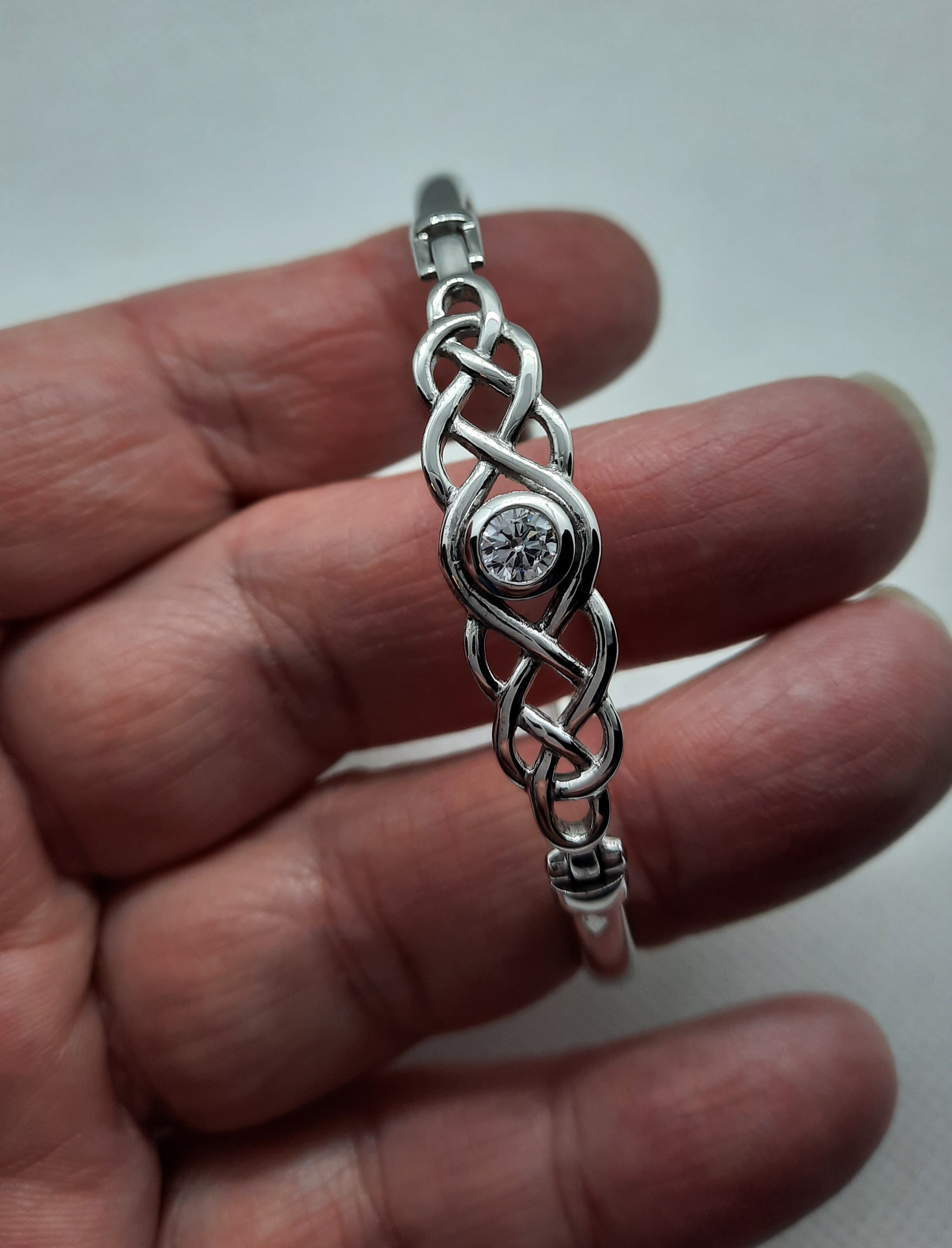 Sterling Silver Celtic Knot Bangle set with a Clear Stone