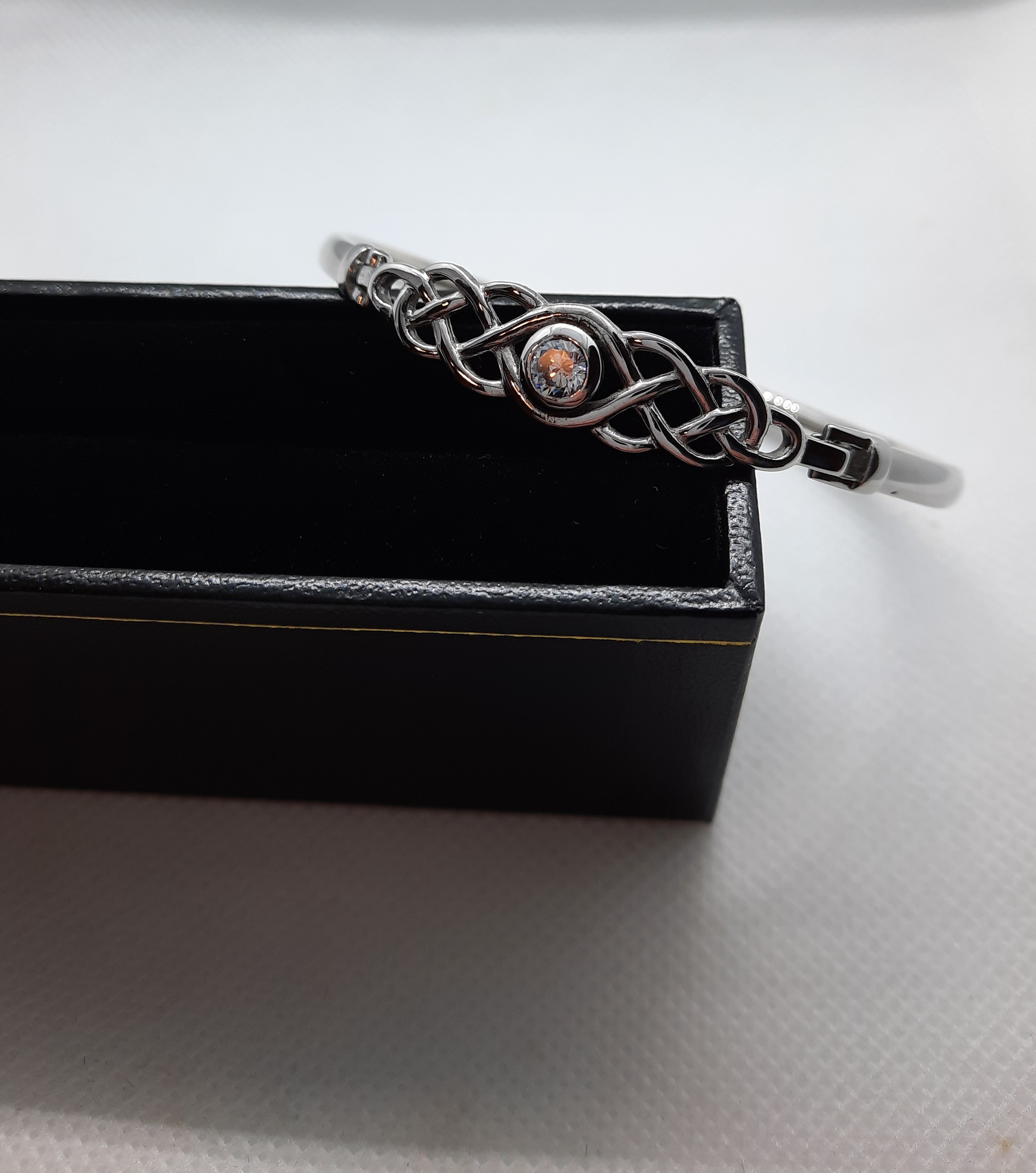 Sterling Silver Celtic Knot Bangle set with a Clear Stone