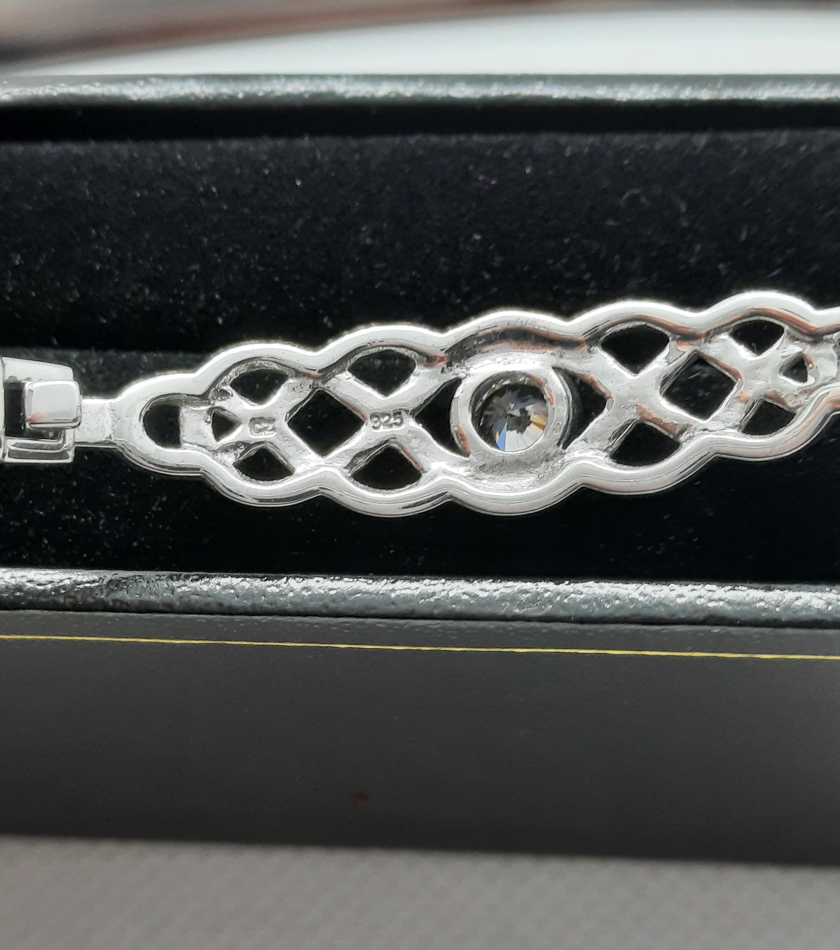 Sterling Silver Celtic Knot Bangle set with a Clear Stone