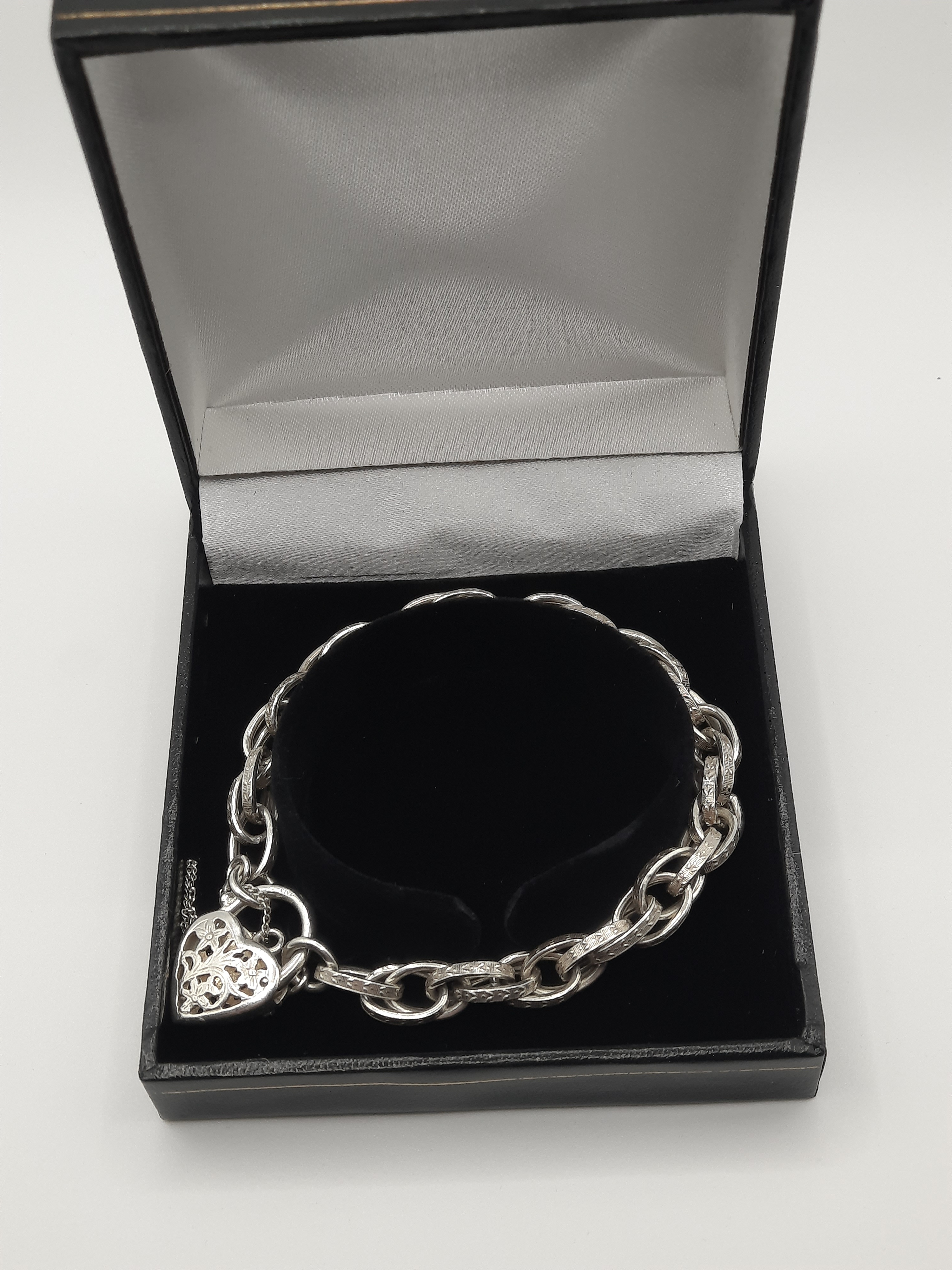 Sterling Silver Patterned Double Link Bracelet with Fancy Heart Padlock