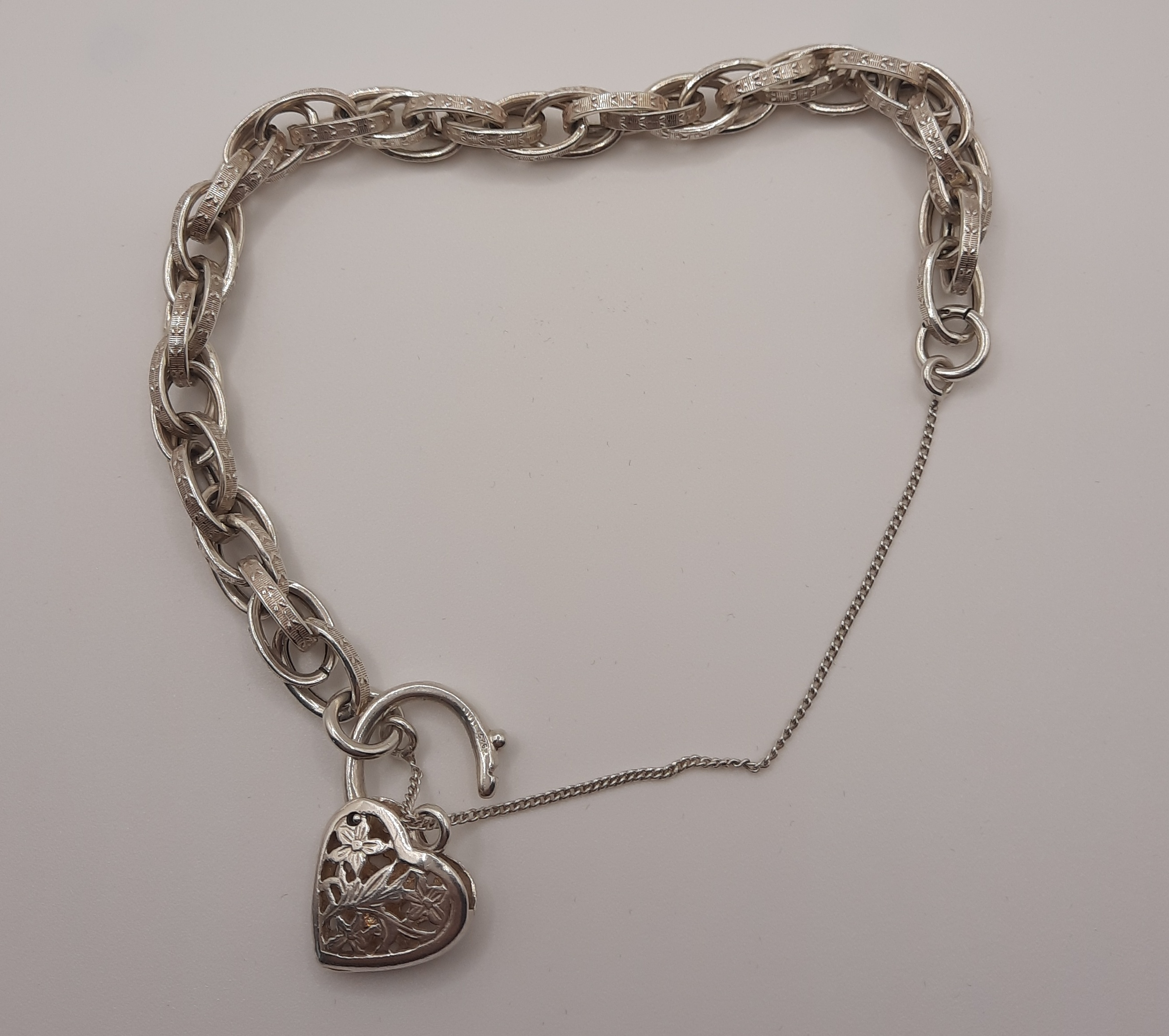 Sterling Silver Patterned Double Link Bracelet with Fancy Heart Padlock