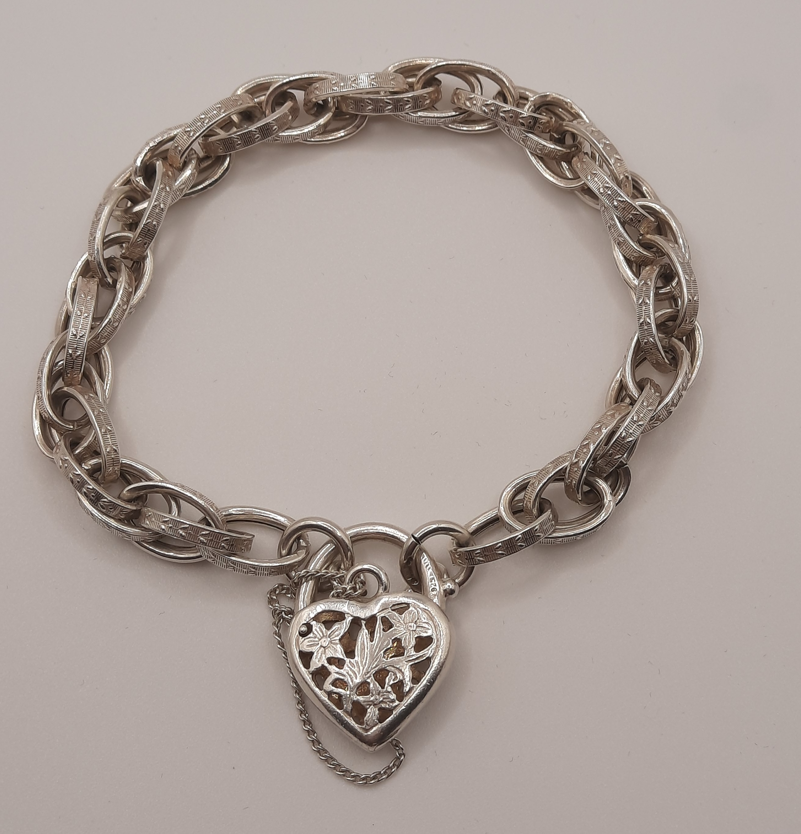Sterling Silver Patterned Double Link Bracelet with Fancy Heart Padlock