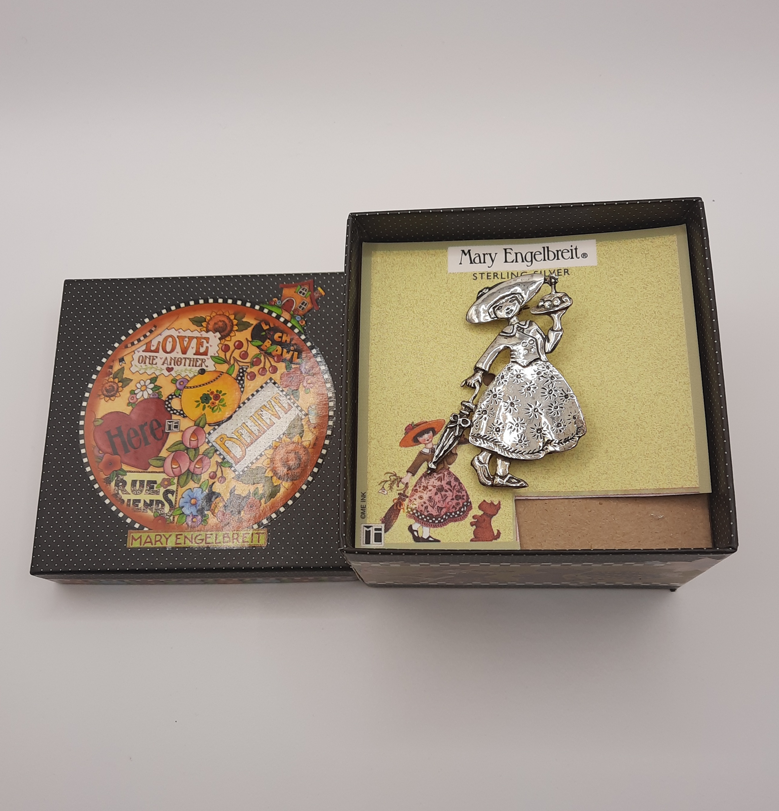 Mary Engelbreit Female Figure with Umbrella and Cake Brooch in Sterling Silver