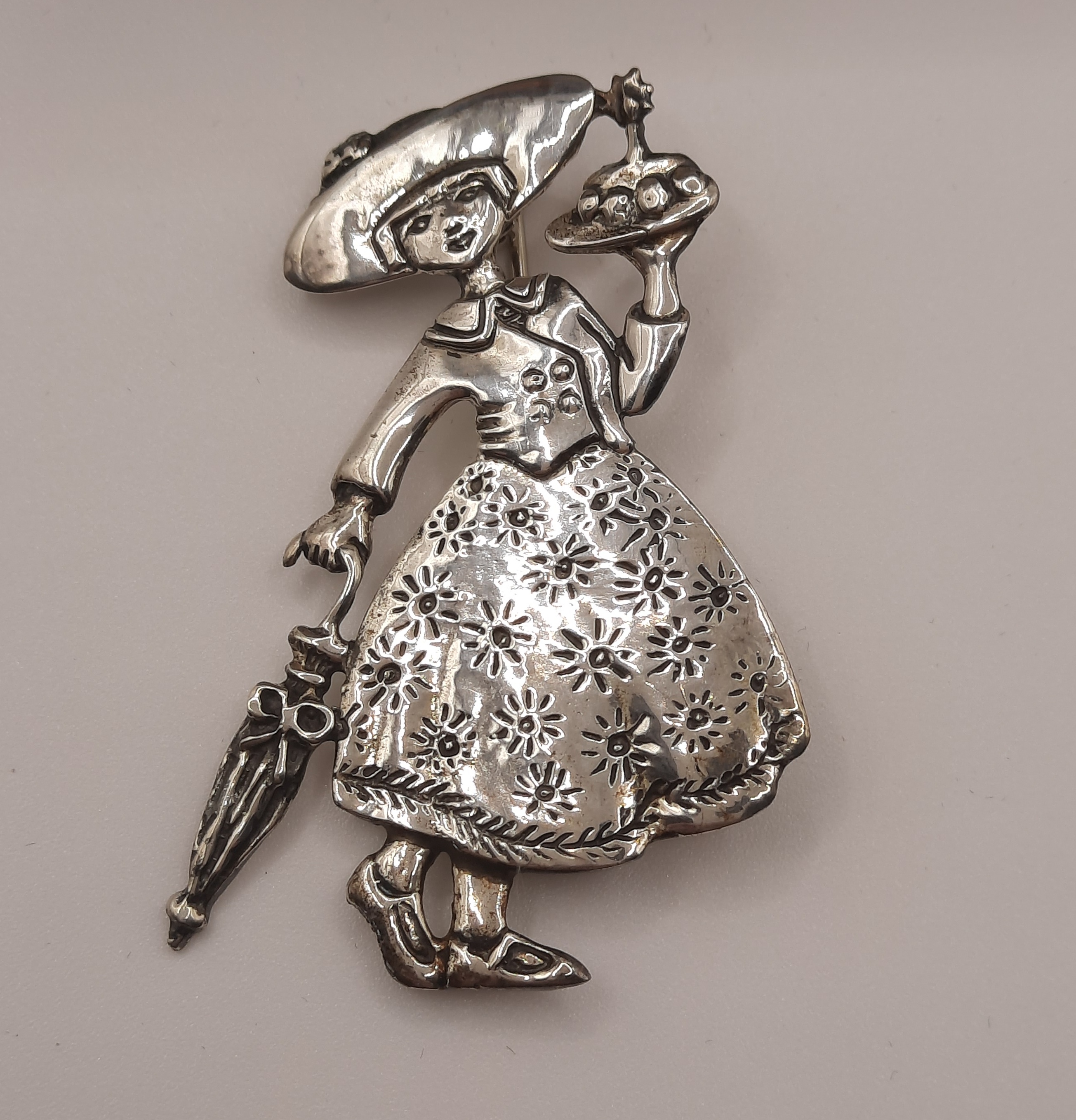 Mary Engelbreit Female Figure with Umbrella and Cake Brooch in Sterling Silver