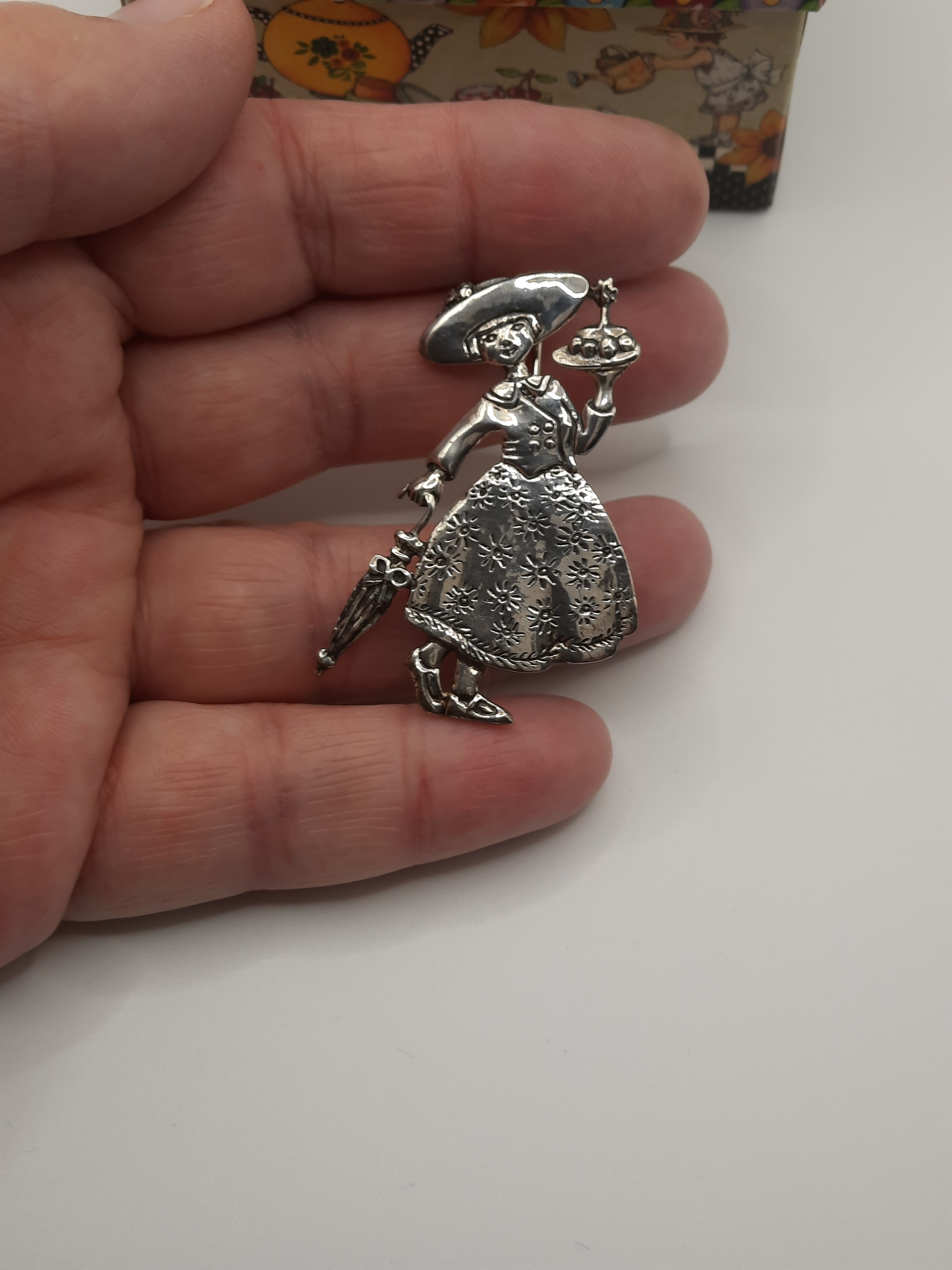 Mary Engelbreit Female Figure with Umbrella and Cake Brooch in Sterling Silver