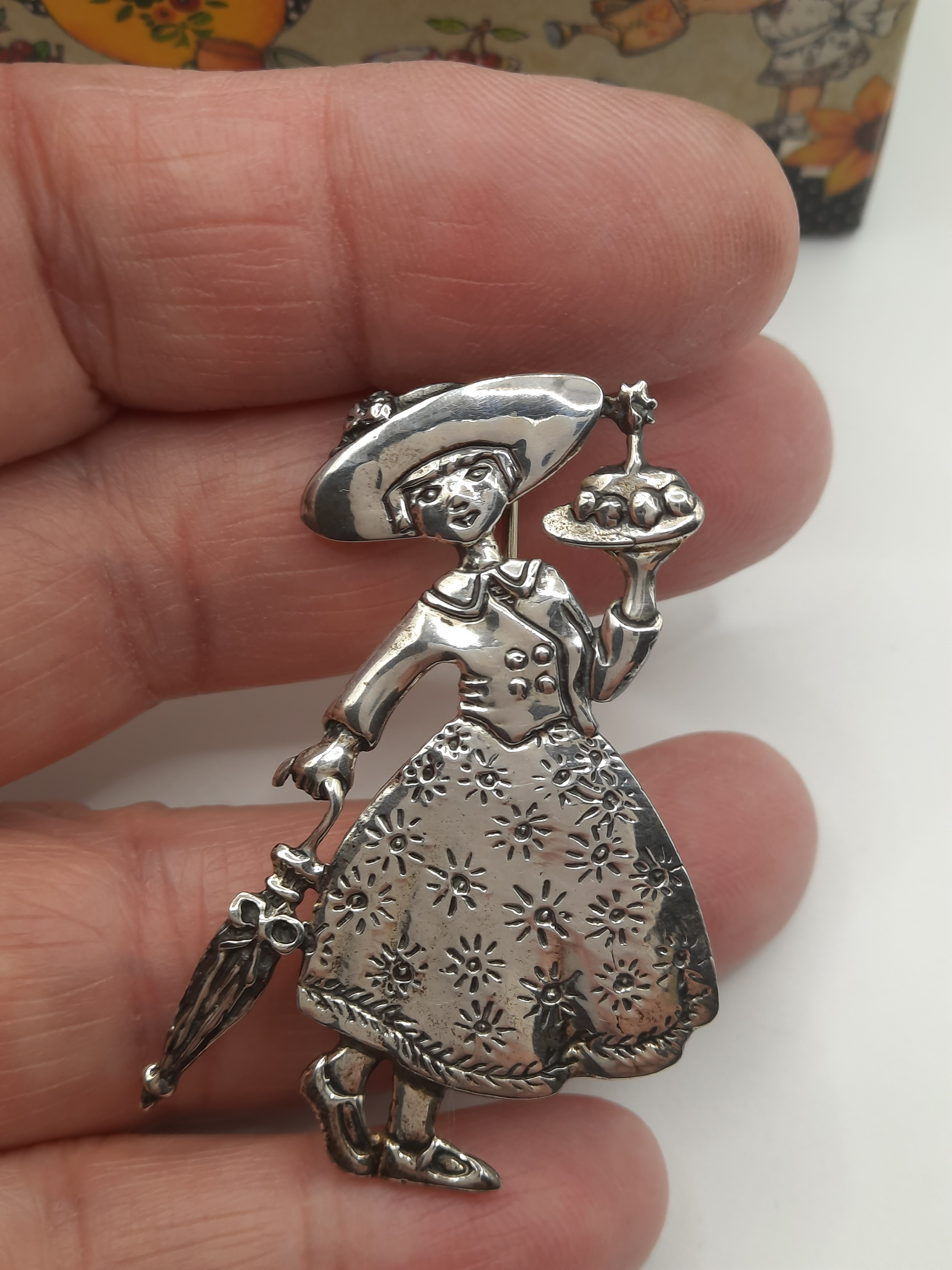 Mary Engelbreit Female Figure with Umbrella and Cake Brooch in Sterling Silver