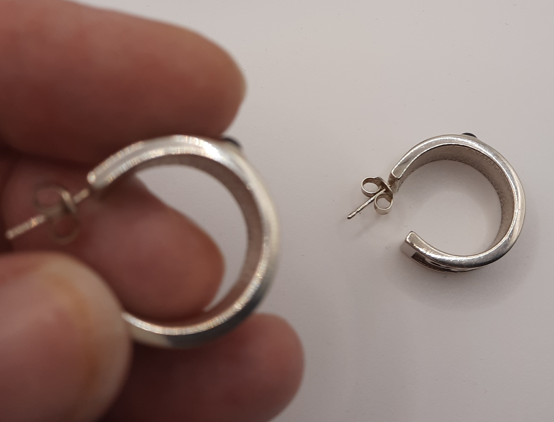 Unusual Ortak Thick Sterling Silver Half Hoop Earrings set with Garnets