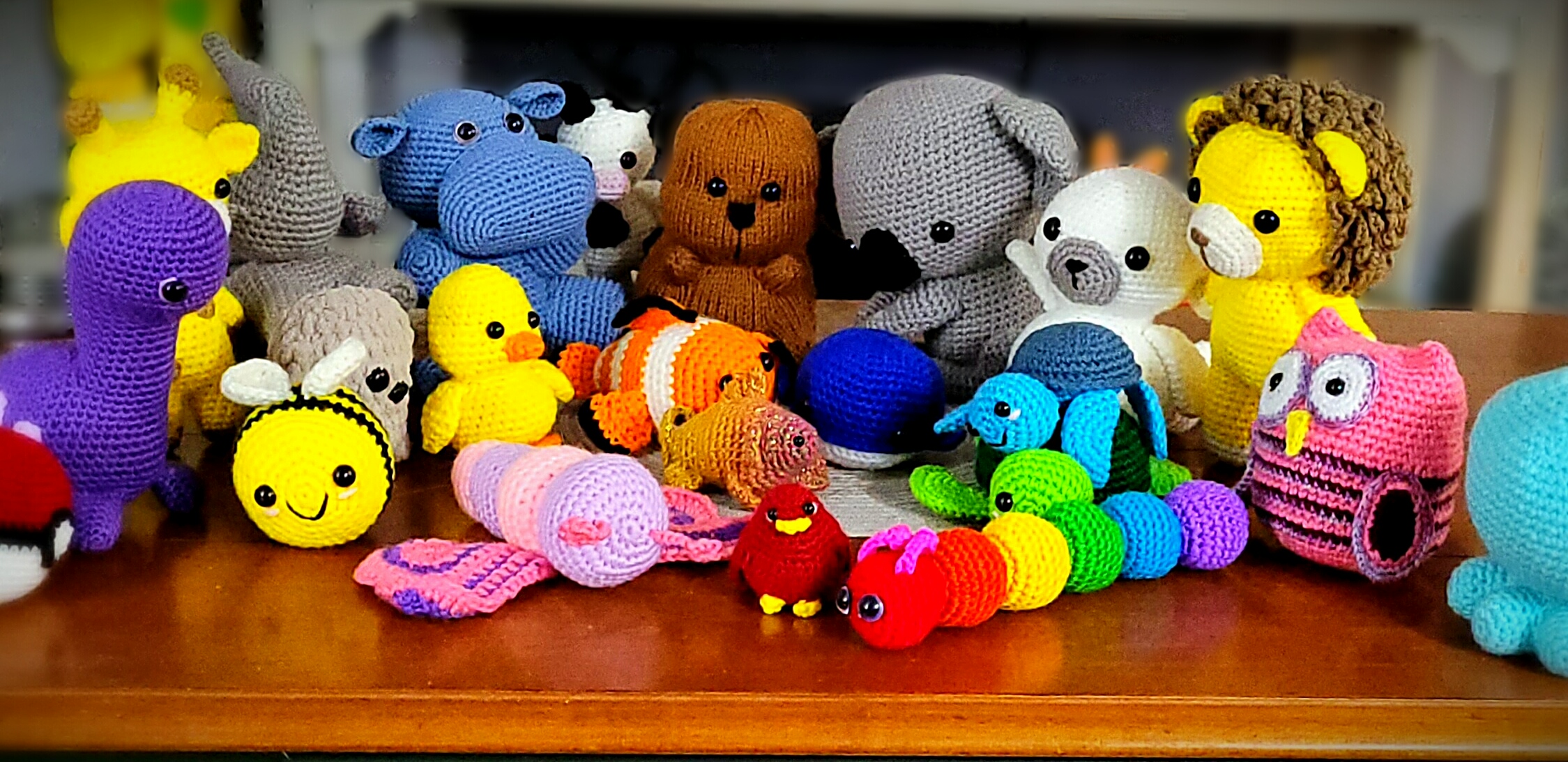Crochet critters gathered on a table