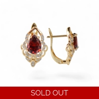 Gold color earrings with gold pla..