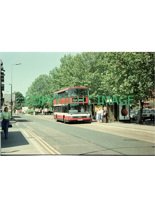 35mm Colour neg Wilts & Dorset DAF DB 250 / Optare Spectra 3104
