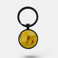 Yellow amber keychain - Pressed a..