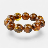 Round Amber ball bracelet – green..